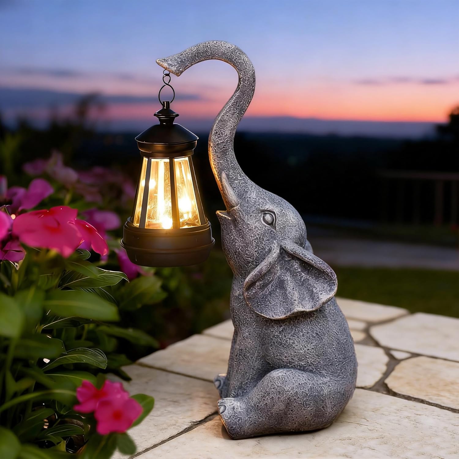Goodeco elephant garden statue with detailed design, perfect for outdoor decor and gifting in backyard or garden settings.