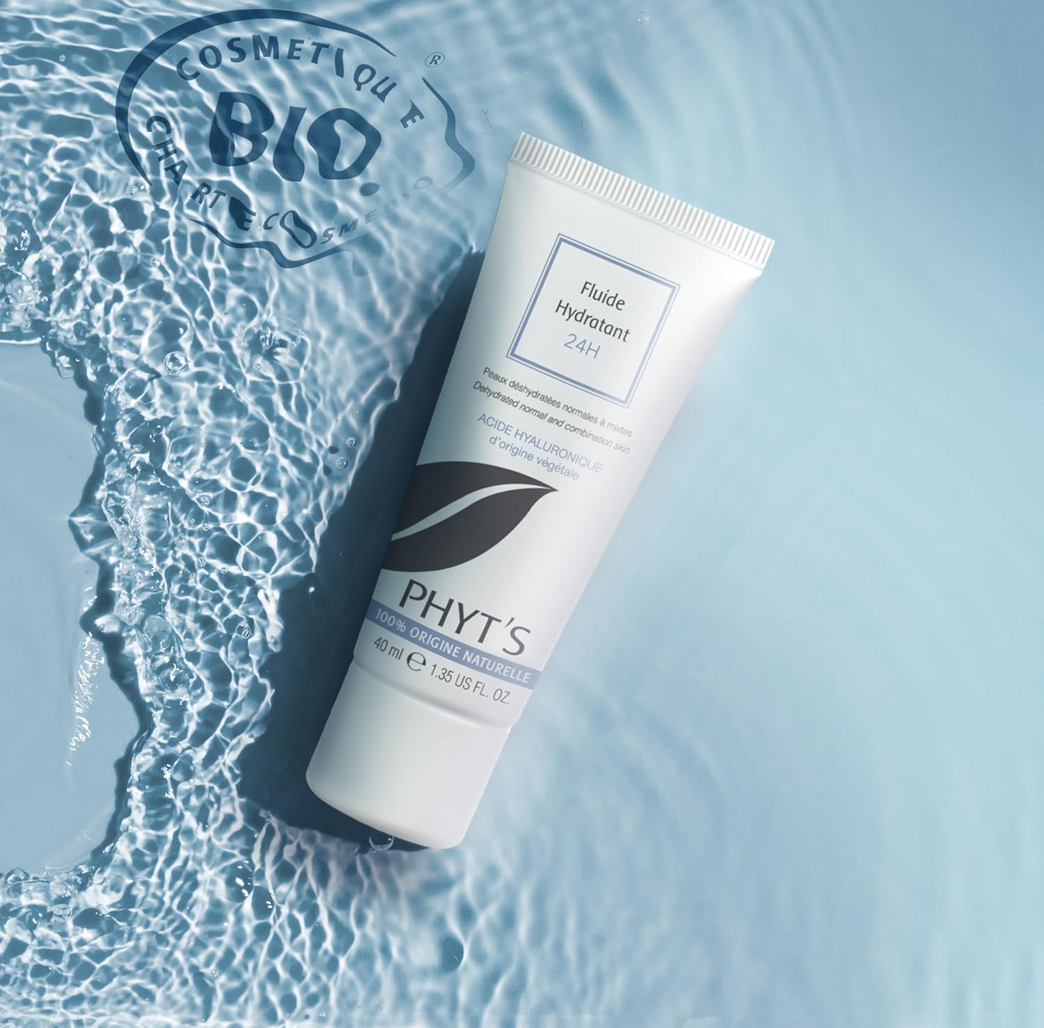 Bottle of Phyt's 24H Moisturizing Fluid face moisturizer with aloe vera extract, clear packaging and pump dispenser.