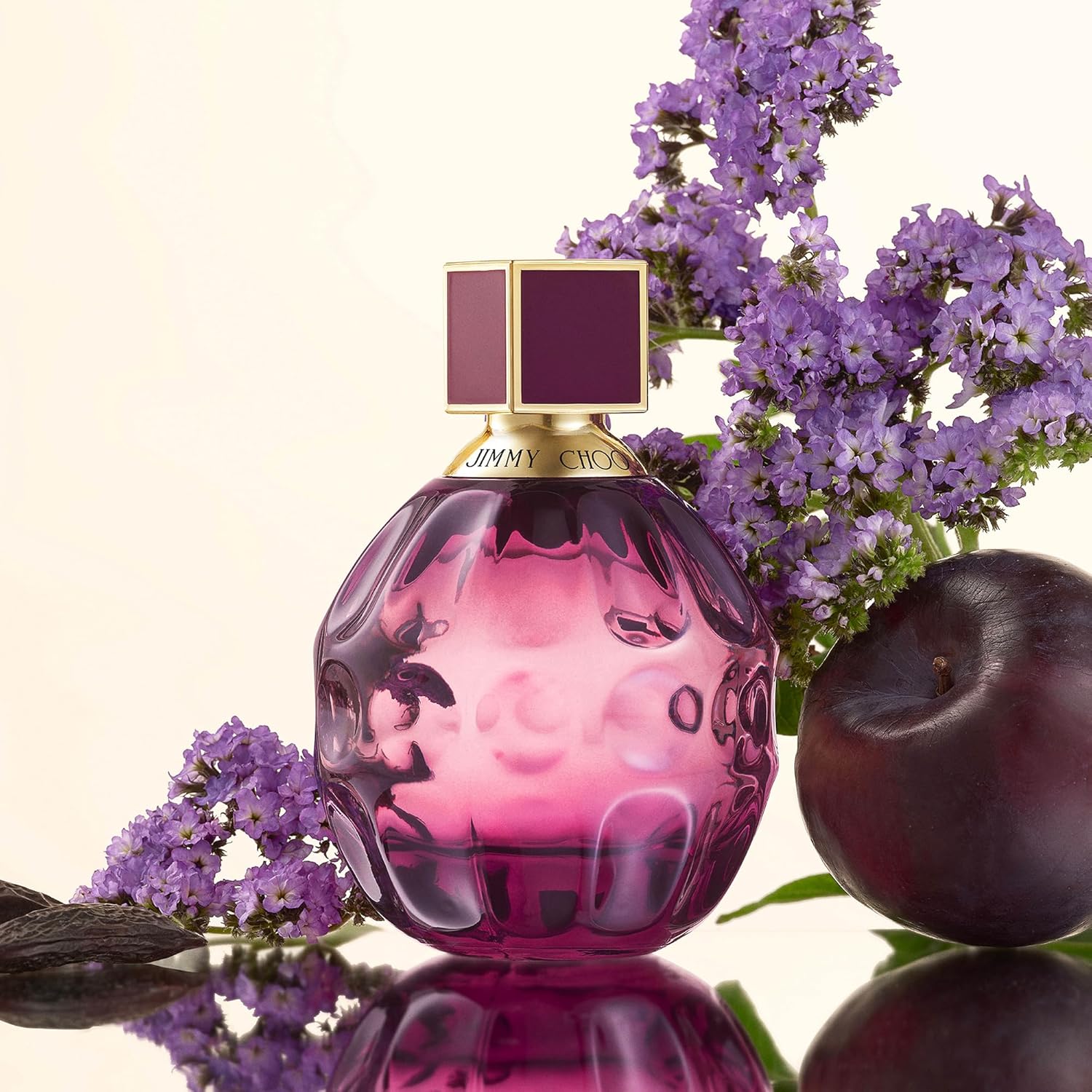 Jimmy Choo Fever Eau de Parfum bottle for women featuring floral gourmand scent, with elegant pink and gold packaging.