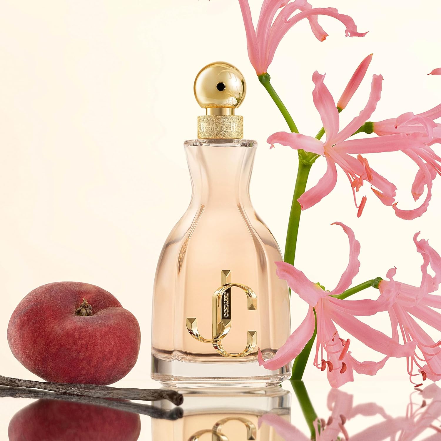 Jimmy Choo I Want Choo women's floral gourmand perfume bottle with elegant design and floral accents.