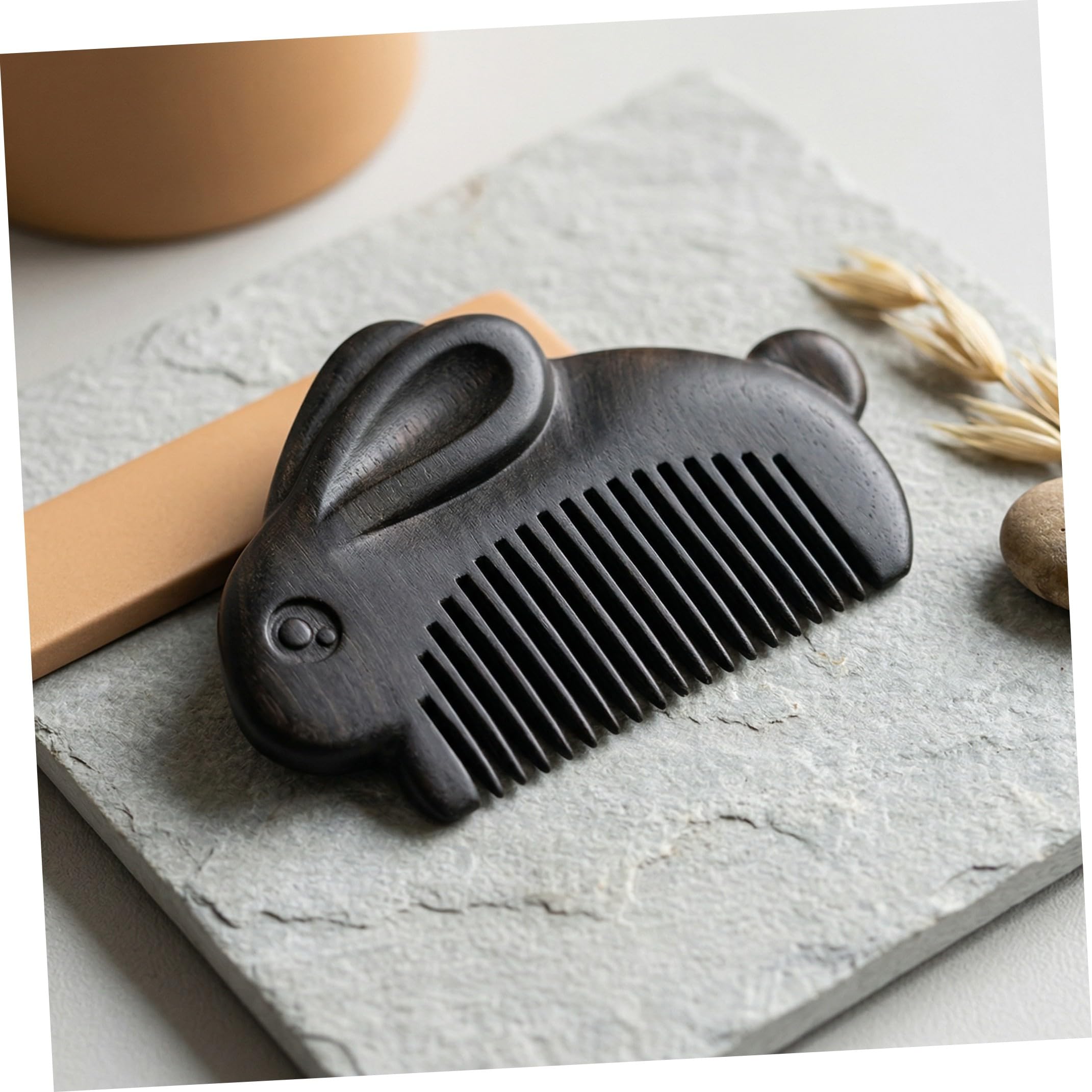 CATIEBYE wooden hair comb with bunny design, small portable massage and detangling tool for scalp stimulation and hair care.