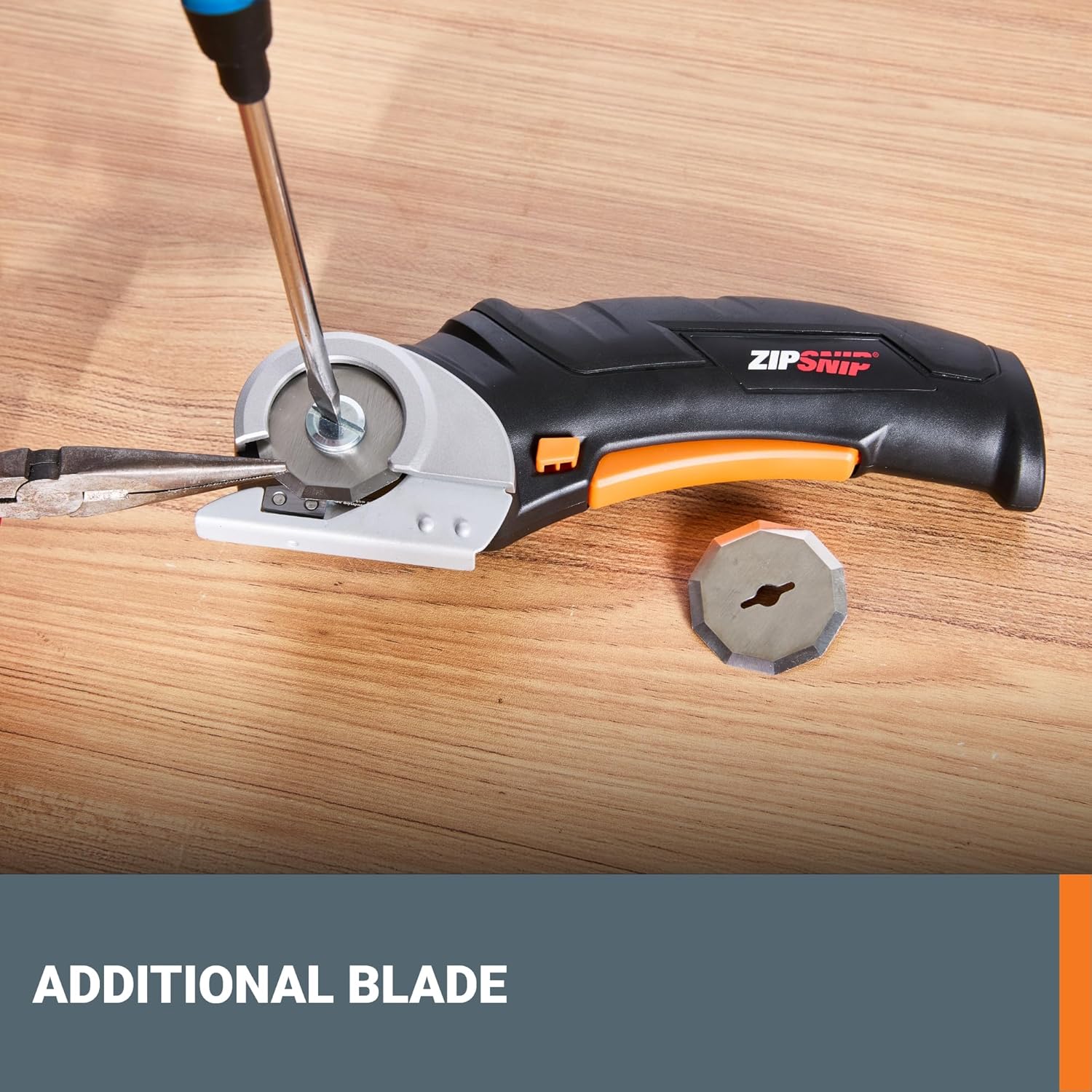 Elefair Worx Zipsnip cordless electric scissors cutting through cardboard with rechargeable battery and ergonomic handle.