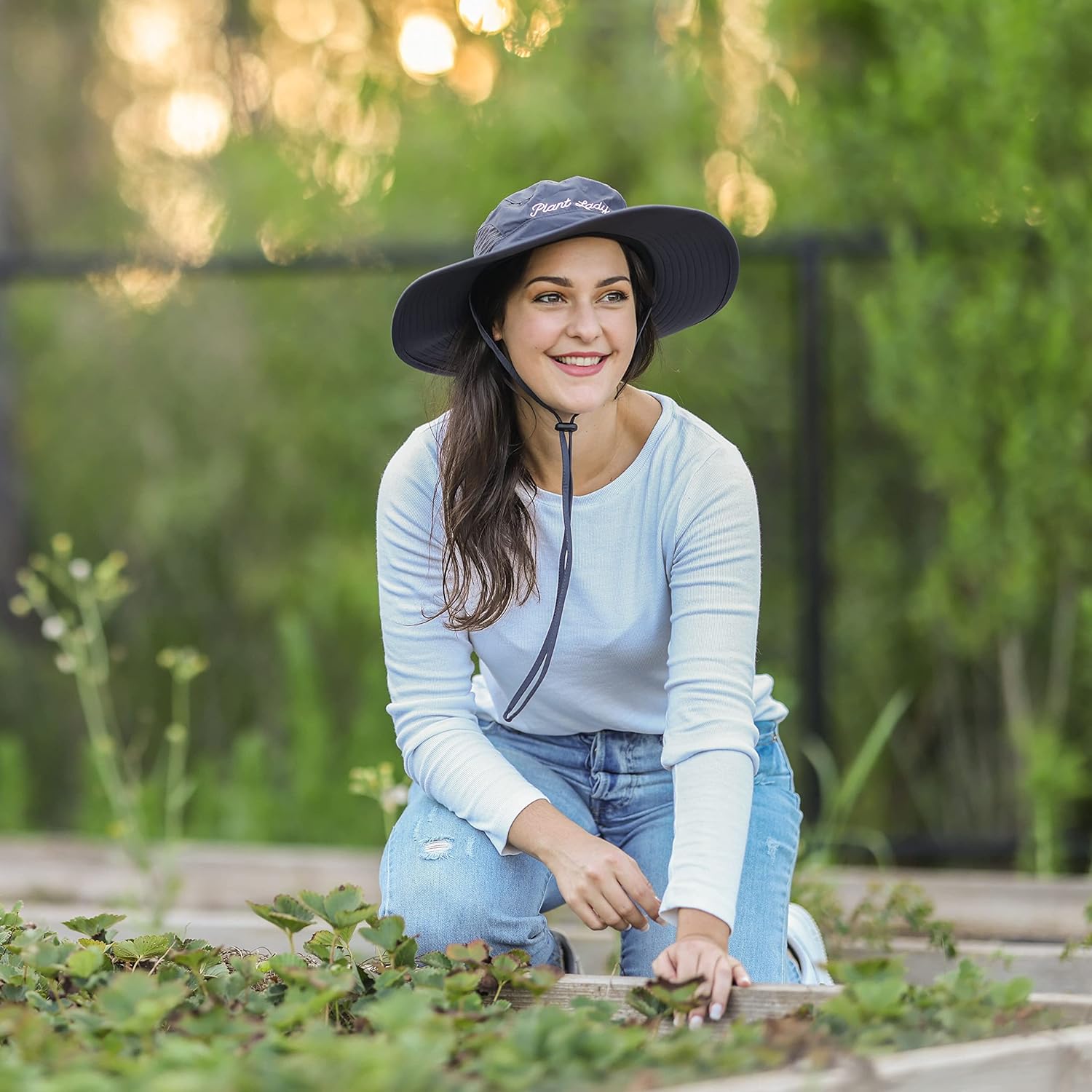 Laila and Lainey Plant Lady wide brim waterproof gardening hat for women, green sun hat with adjustable strap for gardening.