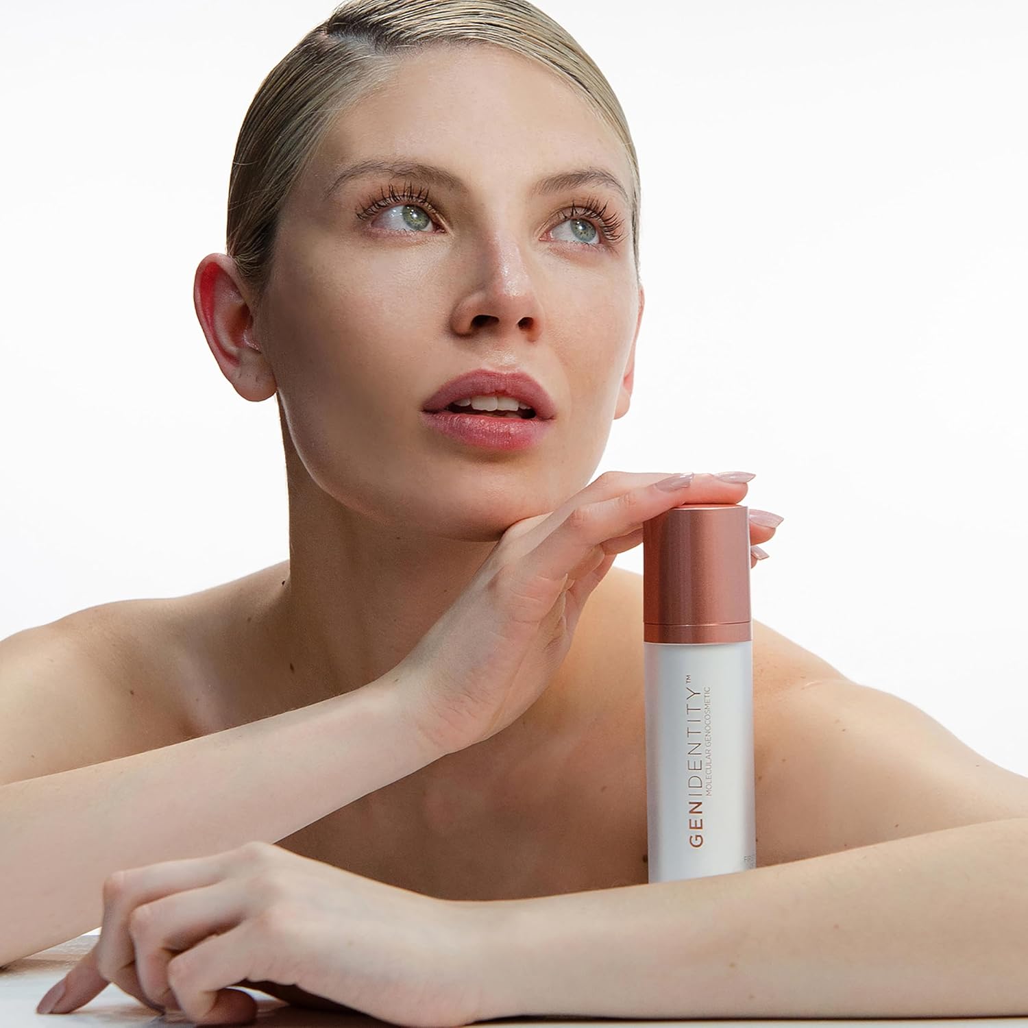 Gen Identity anti-aging pre-serum booster with hyaluronic acid for face, showing a clear serum bottle with dropper applicator.