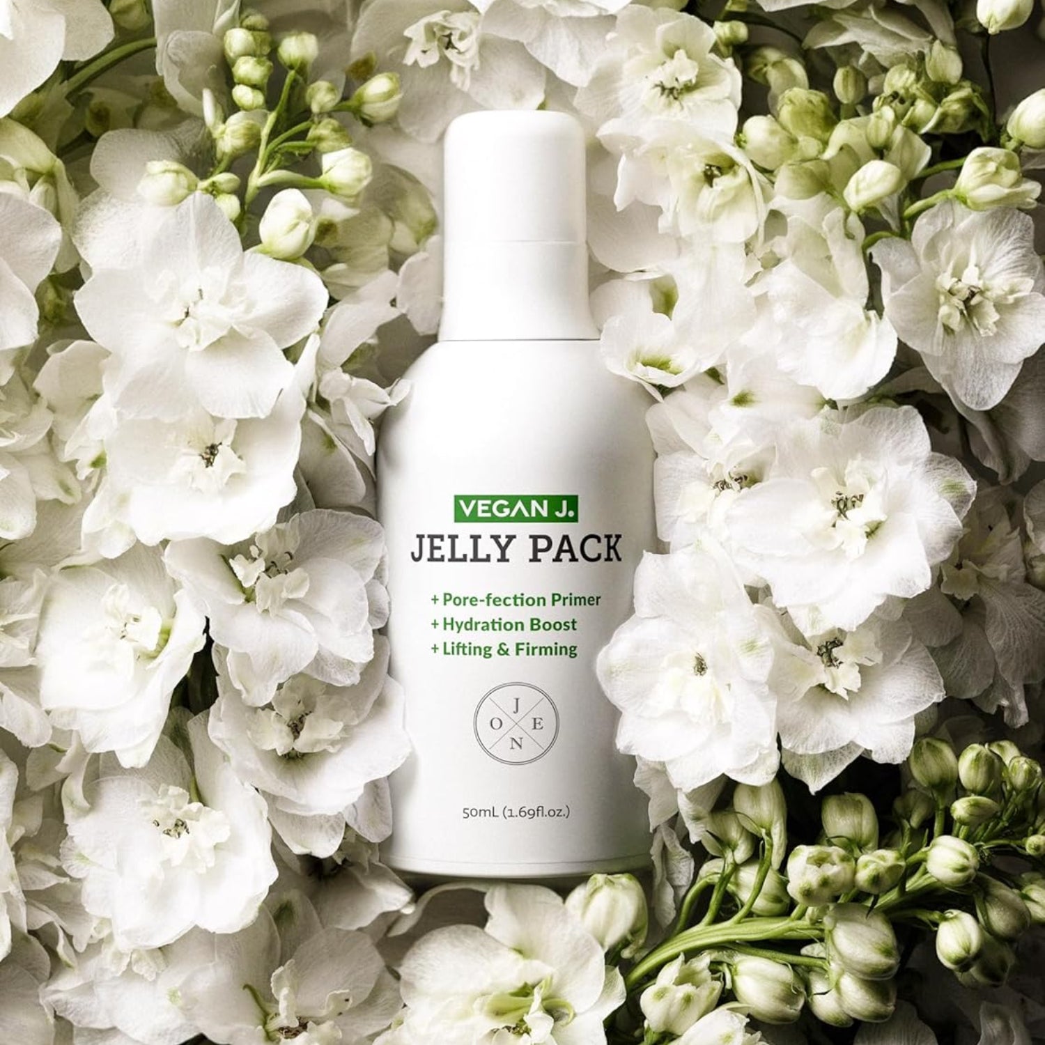 Vegan J. Multi-Use Primer Gel with niacinamide, hydrating and firming formula, in a clear tube with a white cap.