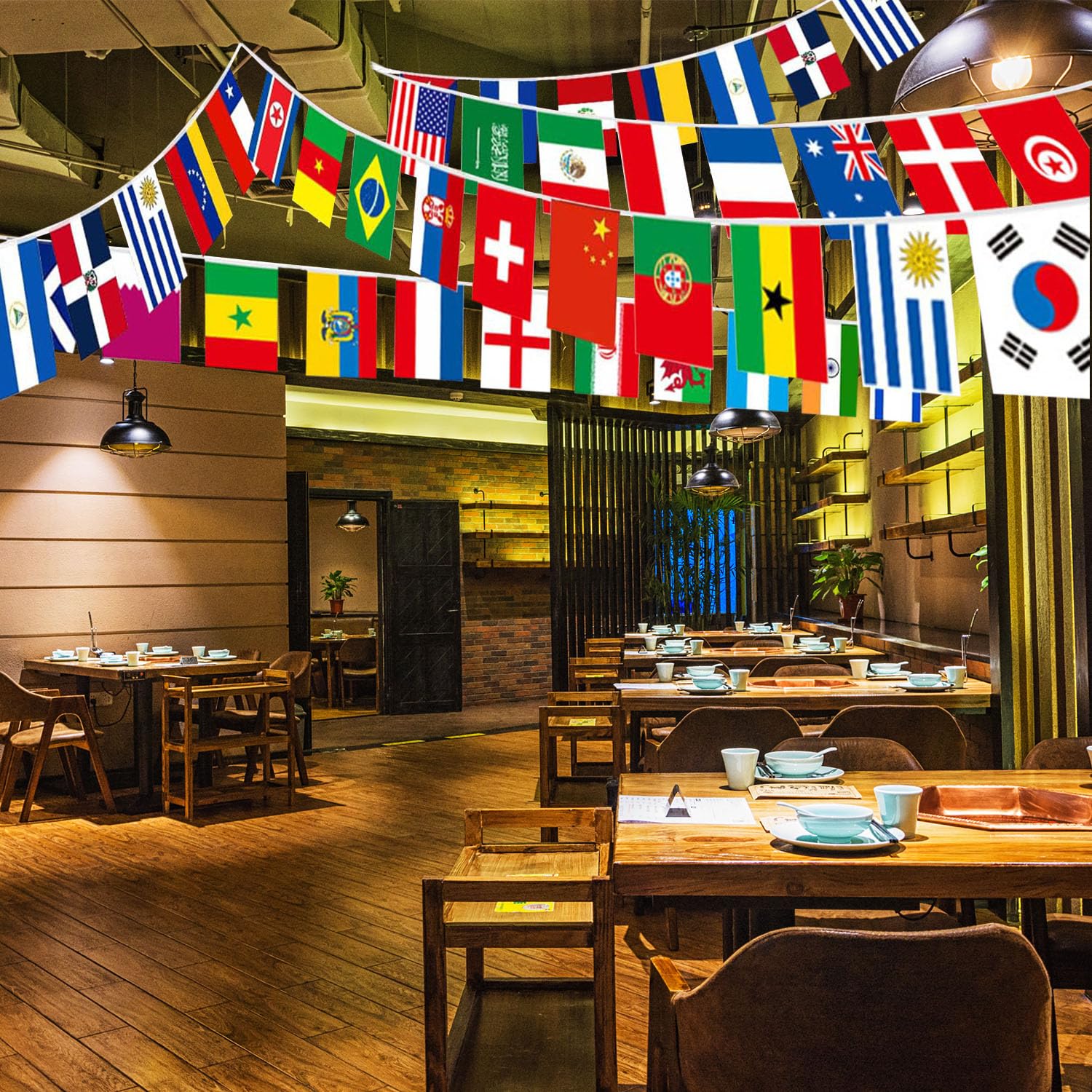 Two packs of 82-foot international flag banners featuring colorful 100 country flags by CrysGuard for global celebration.