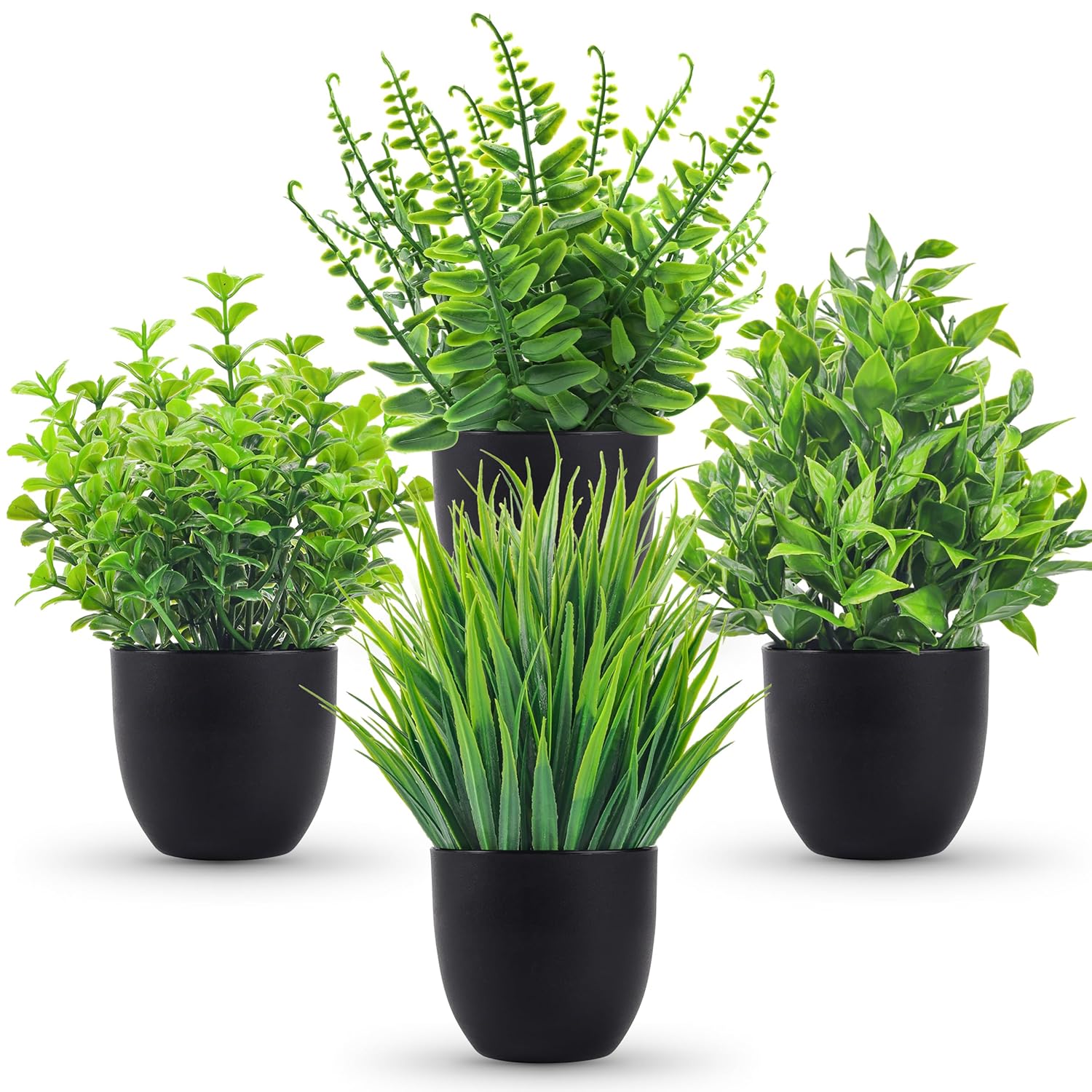 Set of four artificial potted plants with black pots on a white background
