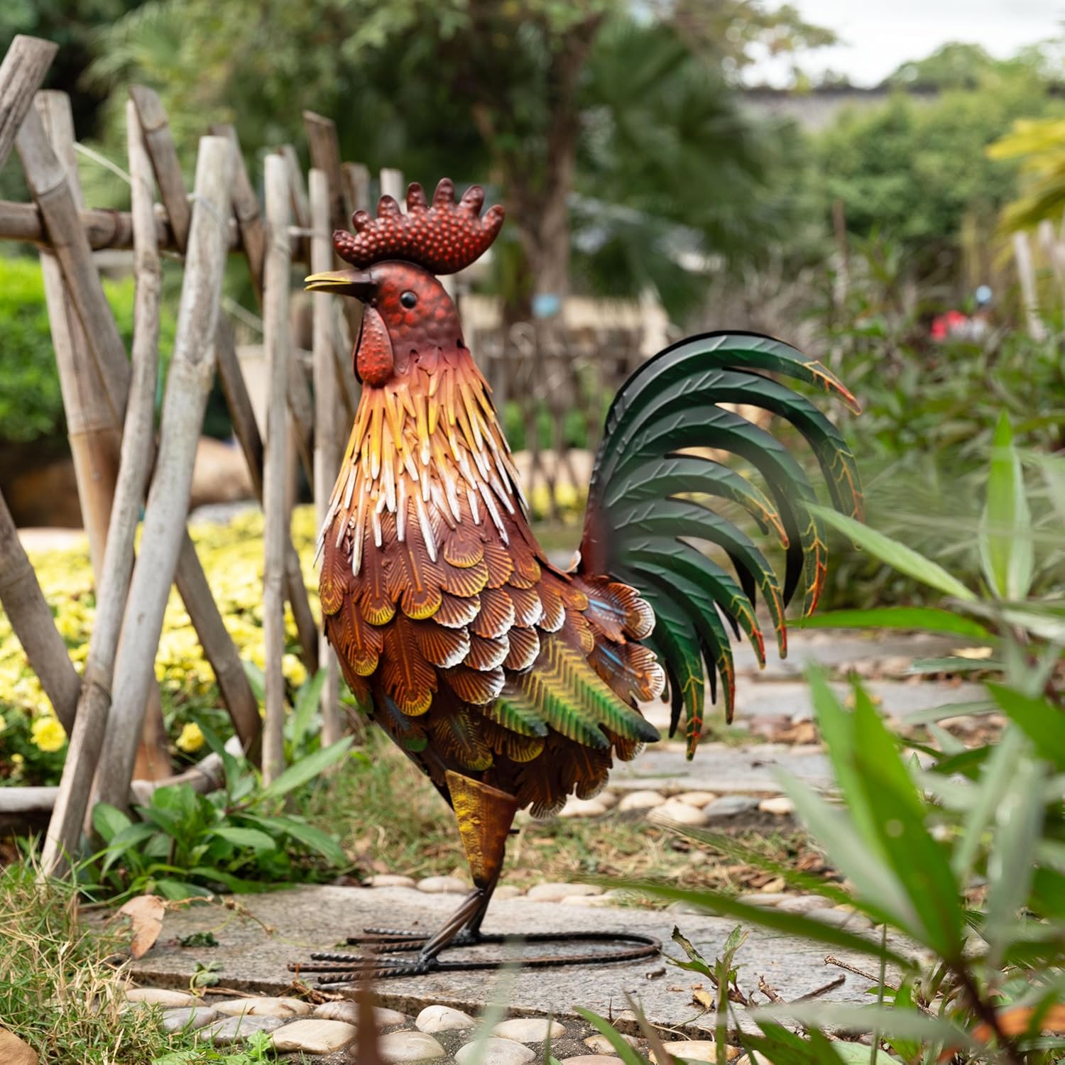 Red metal rooster garden statue by TERESA'S COLLECTIONS, decorative outdoor sculpture with detailed feathers and standing pose.