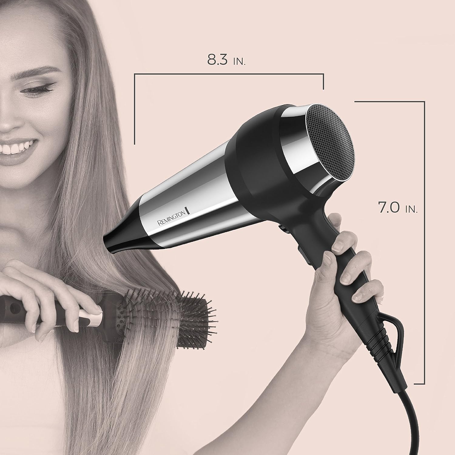 Remington impact-resistant 1875-watt hair dryer with a black and silver design, featuring a concentrator nozzle attached.