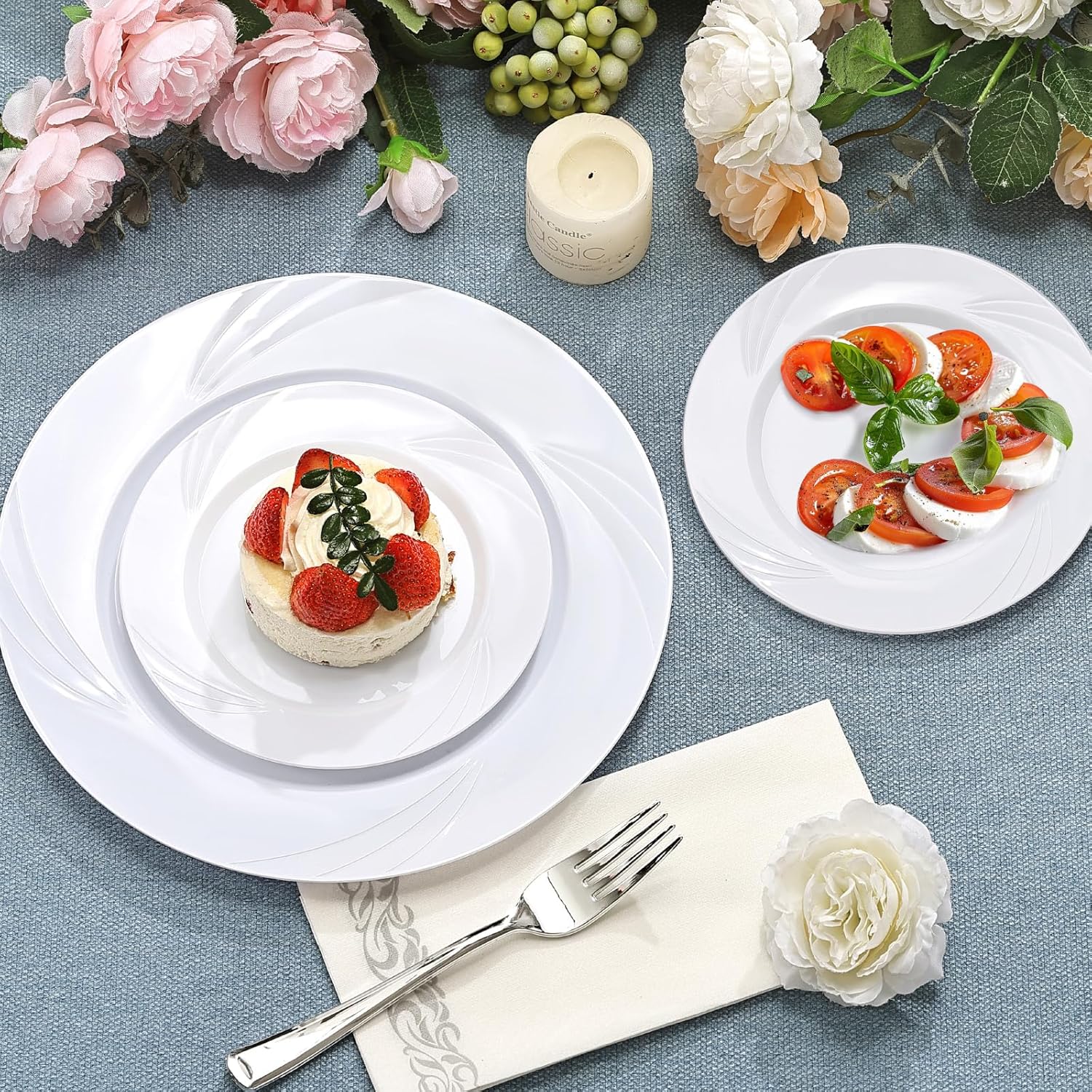 700-piece white swirls plastic dinnerware set by VajilaPhil, elegant disposable plates and utensils for 100 guests.