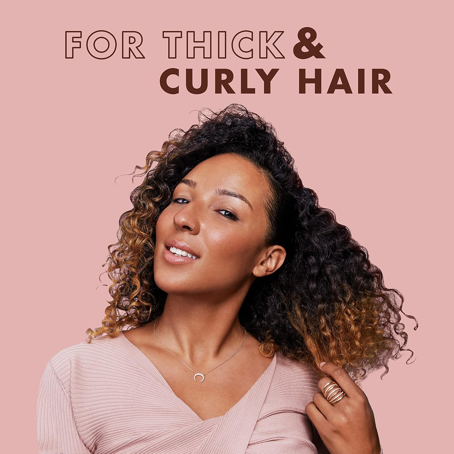 Elefair SheaMoisture curl shampoo and conditioner set with coconut oil, designed to moisturize and define curly hair.