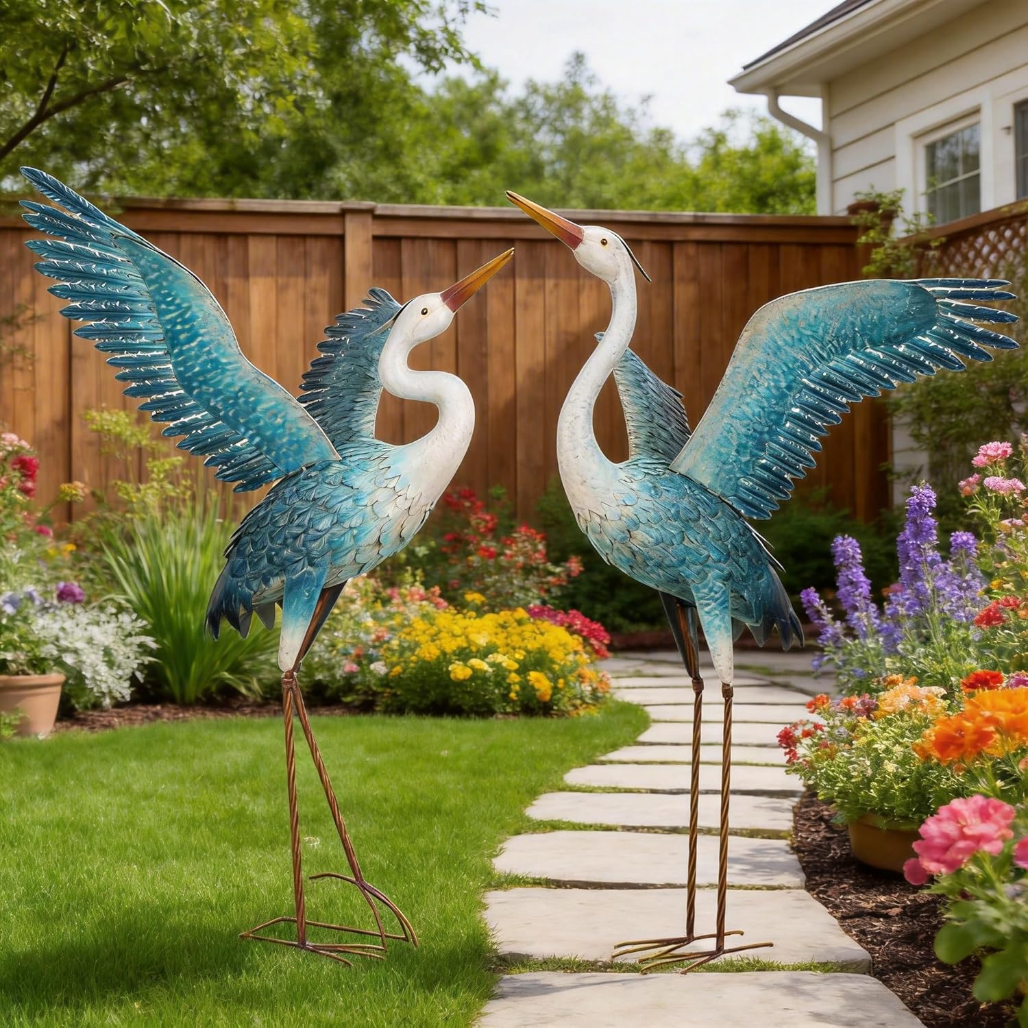 Pair of chisheen outdoor metal heron crane garden statues in white and blue, perfect for yard art and outdoor decoration.