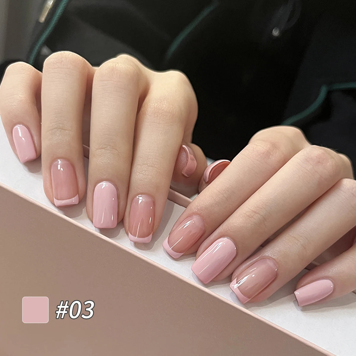 Close-up of pink semi-solid nail polish glue in a can, showcasing vibrant color and smooth texture for nail salon use