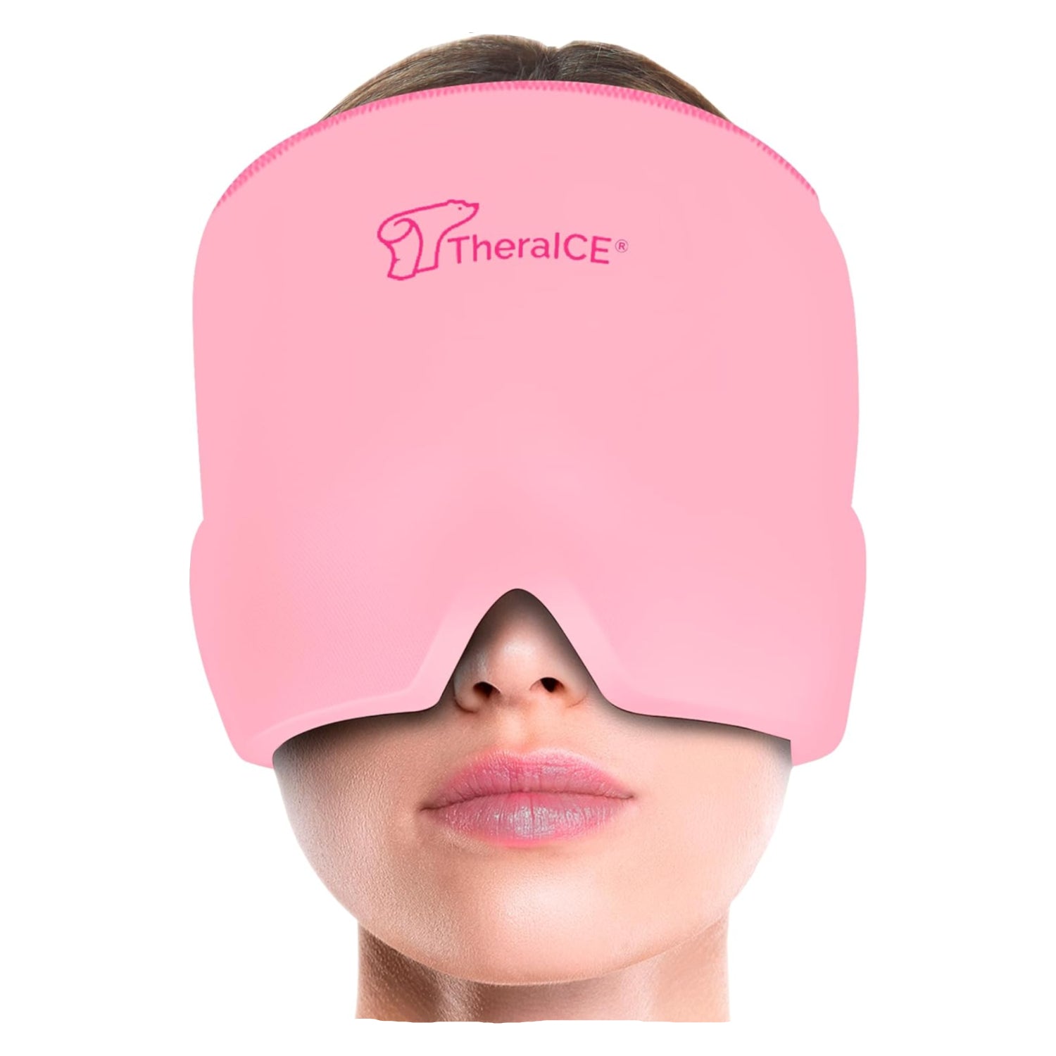 Pink TheraICE eye mask on a person's face with a white background