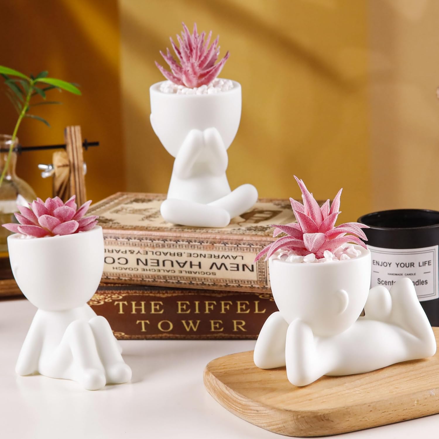 Set of three artificial pink succulent plants in white pots, ideal for desk or room decor by Der Rose.