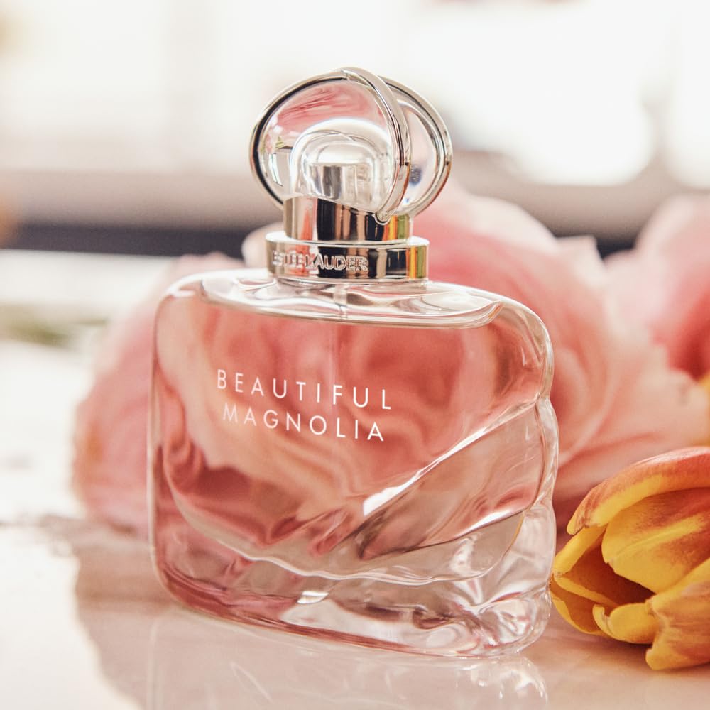 Estée Lauder Beautiful Magnolia Eau de Parfum spray with lush magnolia notes, displayed in a sleek glass bottle.