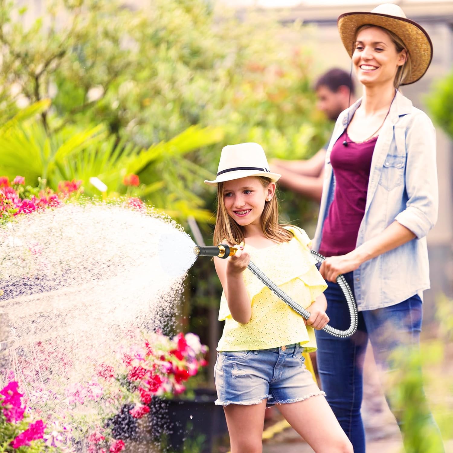 Expandable 100 ft garden hose by Rosy Earth, heavy-duty stainless steel water hose with kink-free, flexible design and no bite feature.