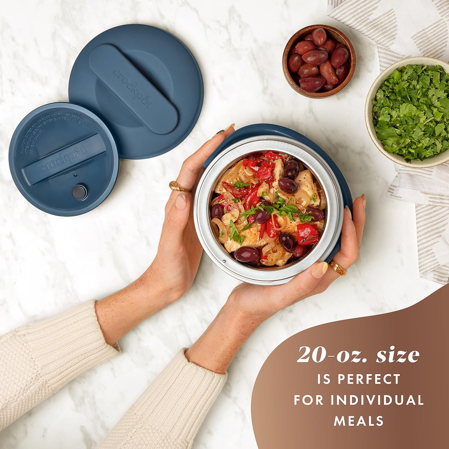 Crock-Pot 20-ounce electric lunch box in faded blue with handle and warming compartment, portable food warmer for on-the-go meals.