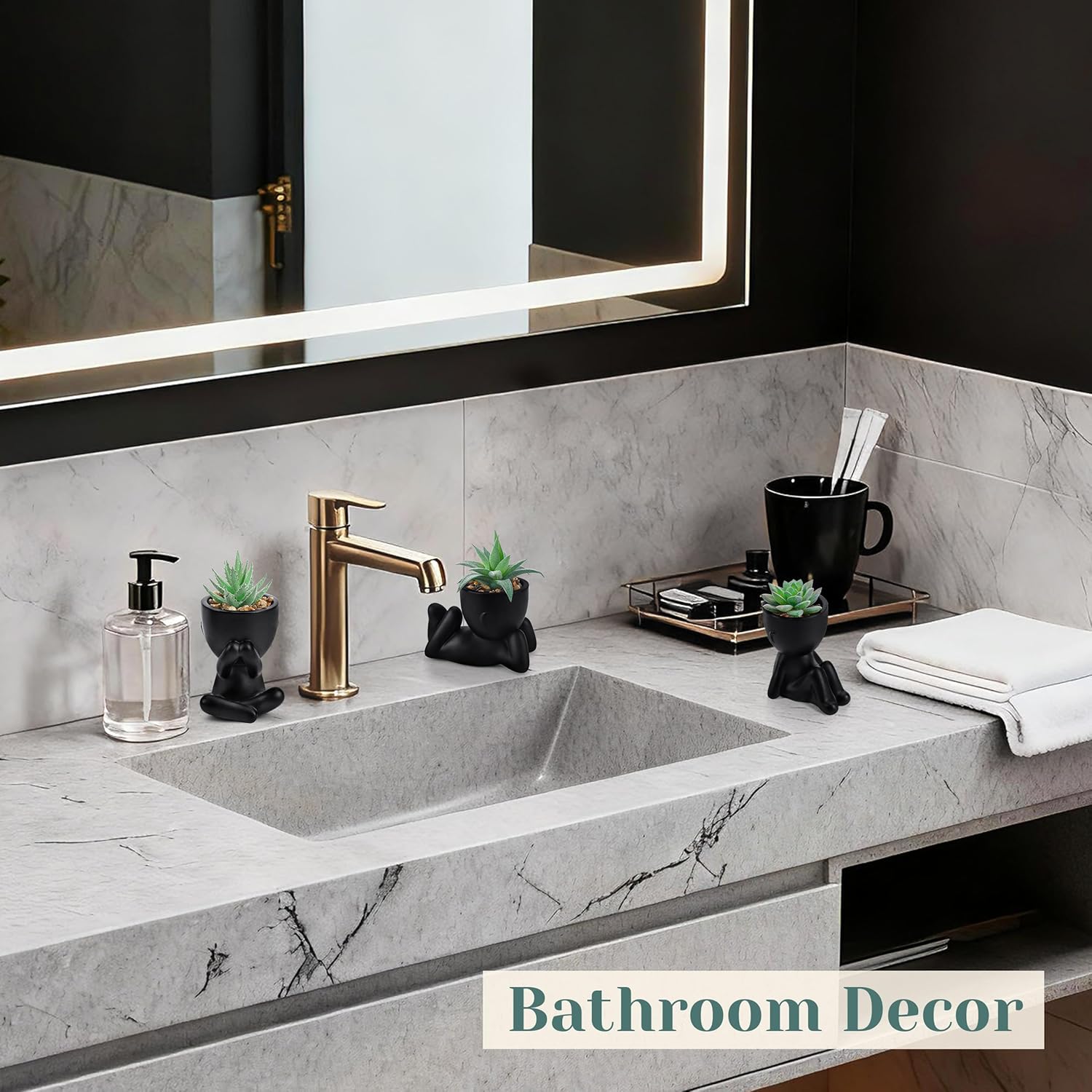 Three artificial succulent plants from Der Rose, designed for black bathroom or bedroom decor, with green leaves and realistic textures.