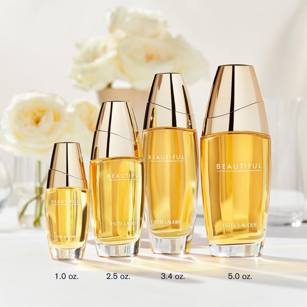 Estée Lauder Beautiful Eau de Parfum spray featuring a floral bottle with roses, lilies, tuberose, and orange flower notes.