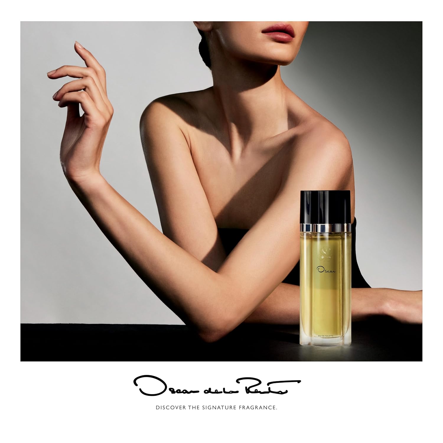 Oscar de la Renta Eau de Toilette perfume spray for women from the Oscar Signature Collection, featuring elegant packaging and a floral bottle