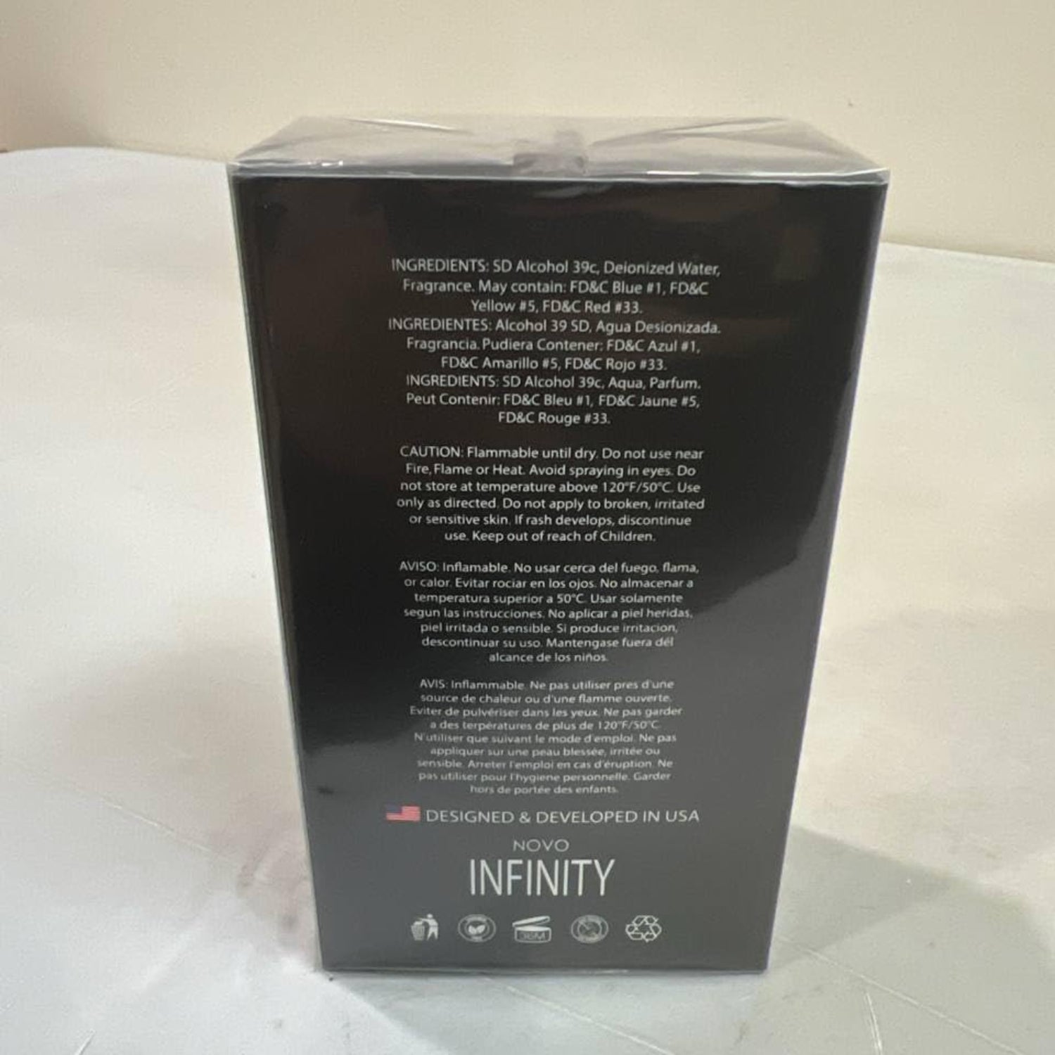 NovoGlow Novo Infinity Eau De Parfum spray for men, 3.4 oz bottle with sleek design and black cap.
