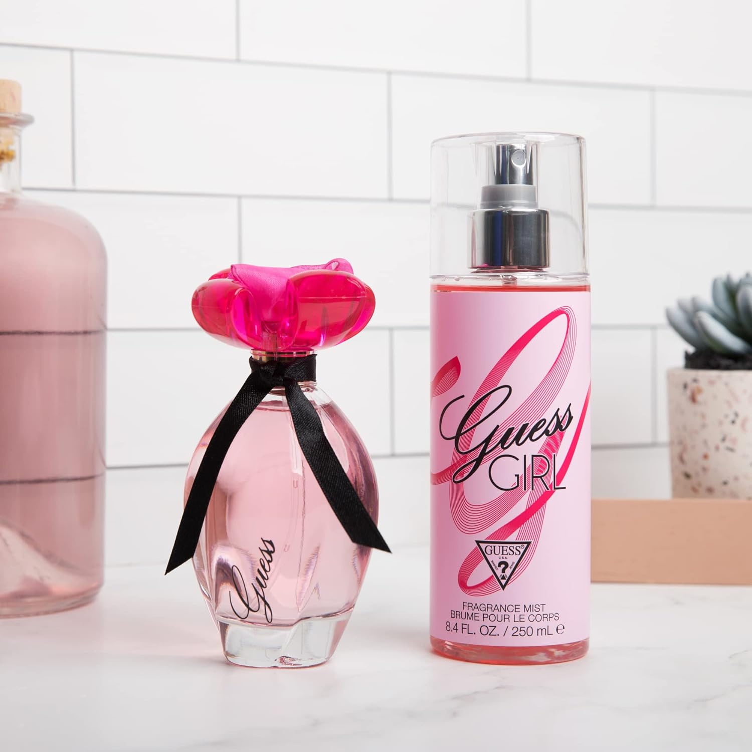 GUESS Girl Eau de Toilette spray for women in 3.4 ounces, featuring a sleek glass bottle with a stylish cap.