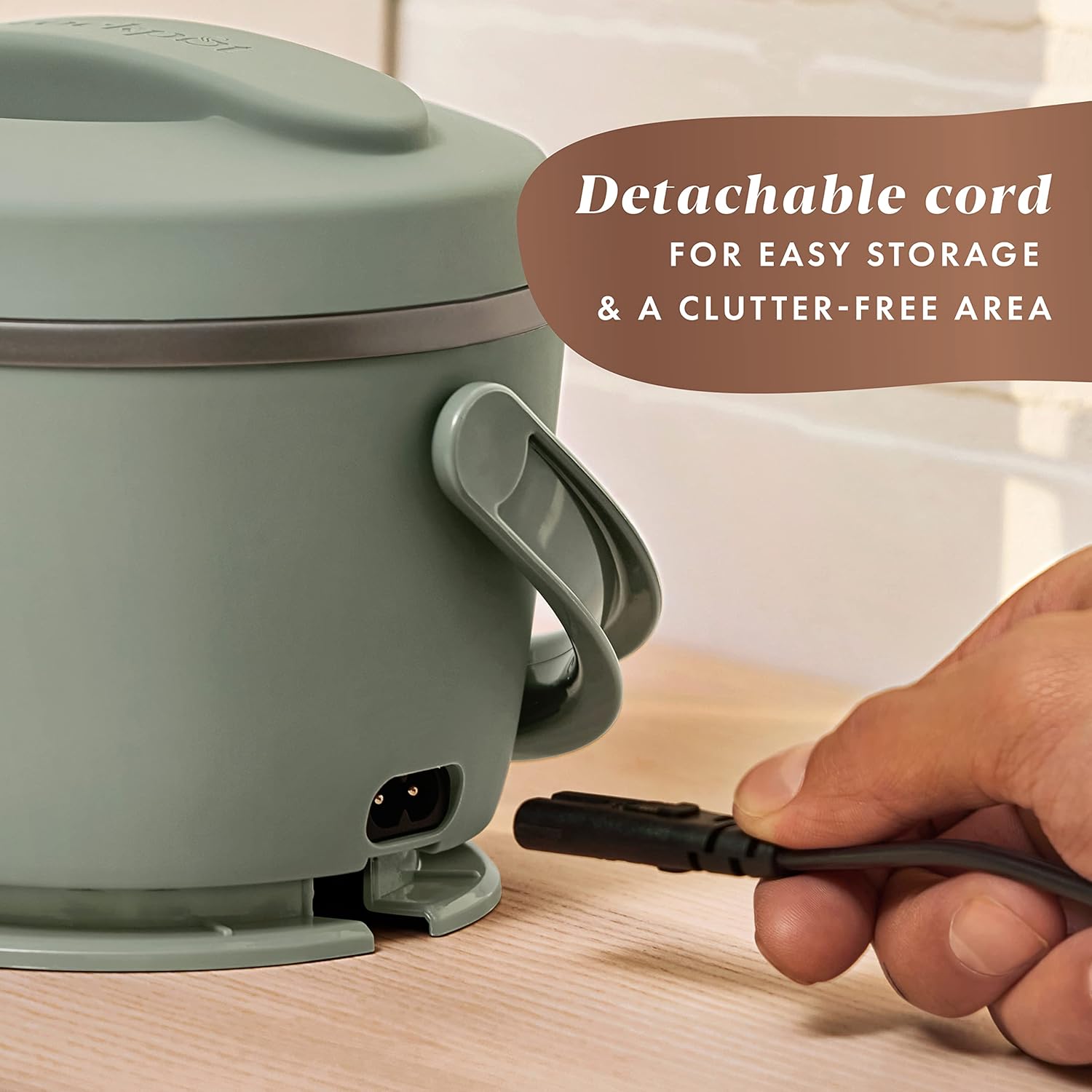 Crock-Pot portable electric lunch box in moonshine green with 20-ounce food warmer and handle, designed for hot meals on the go