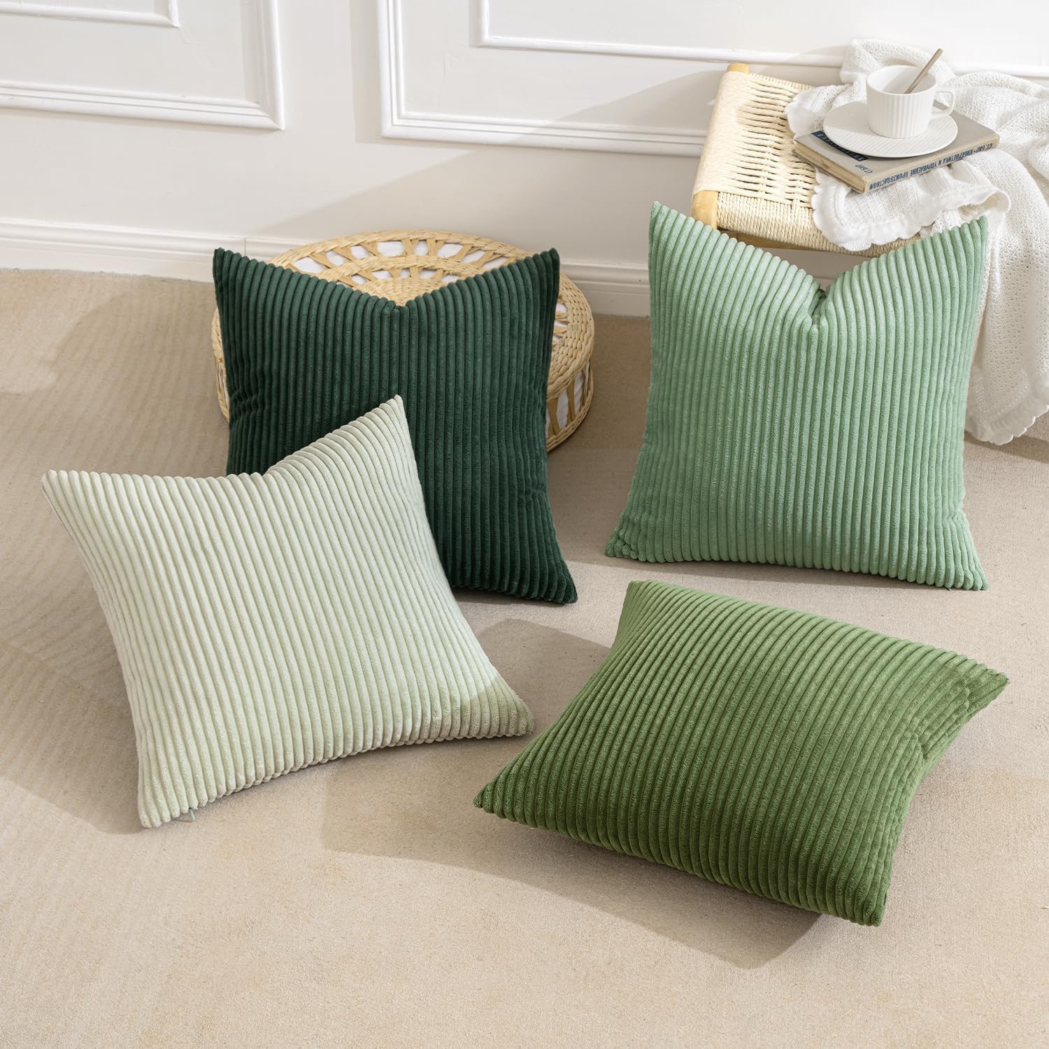 Set of four MIULEE boho farmhouse sage green 18x18 inch throw pillow covers with modern design and textured fabric.