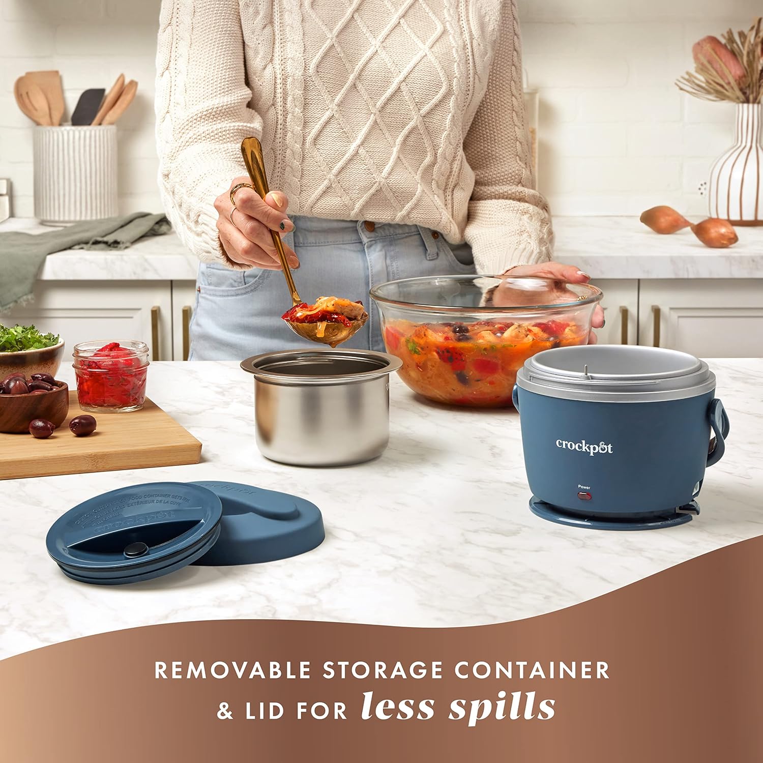 Crock-Pot 20-ounce electric lunch box in faded blue with portable food warmer and compact design for convenient meal heating.