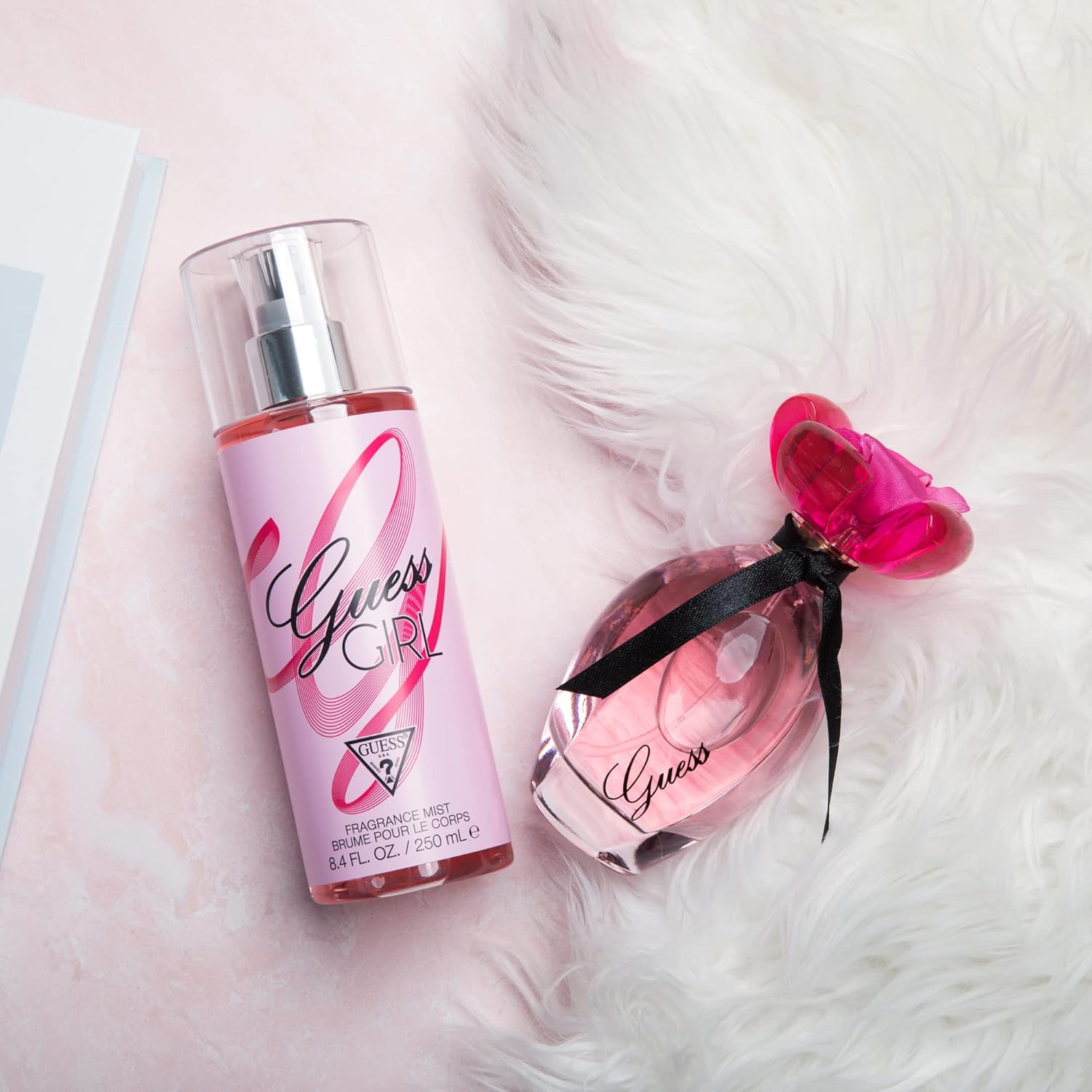 GUESS Girl Eau de Toilette spray for women, 3.4 ounces, featuring a sleek bottle with a stylish design and feminine branding.