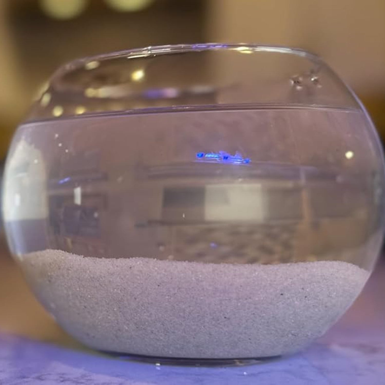 Aqua Natural Sugar White Sand 10lb substrate for aquariums, vivariums, and terrariums, showing fine white sand in a clear container.