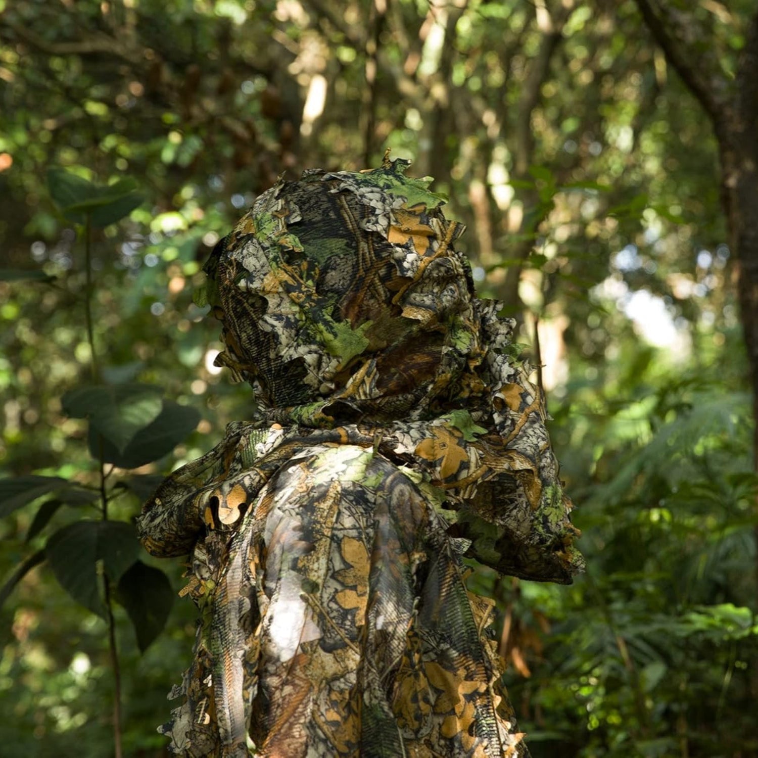 Ginsco Ghillie Suit with full face mask and gloves, 3D leafy camo for men, size M, designed for stealth and outdoor concealment.