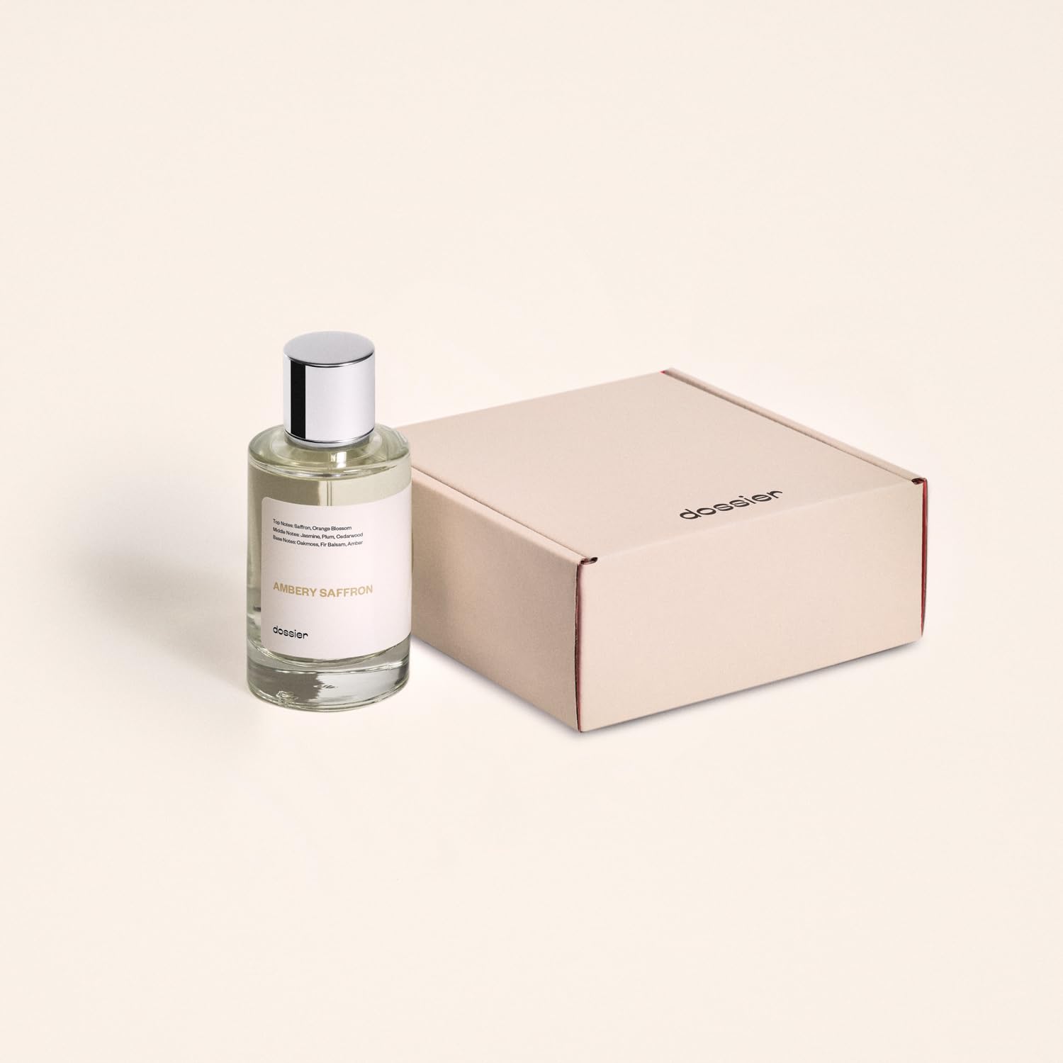 Dossier Ambery Saffron Eau de Parfum bottle with saffron-colored liquid, inspired by MFK Baccarat Rouge 540, vegan fragrance.
