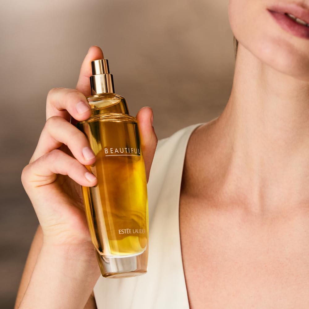 Elegant Estée Lauder Beautiful Eau de Parfum spray with floral notes of rose, lily, tuberose, and orange flower.