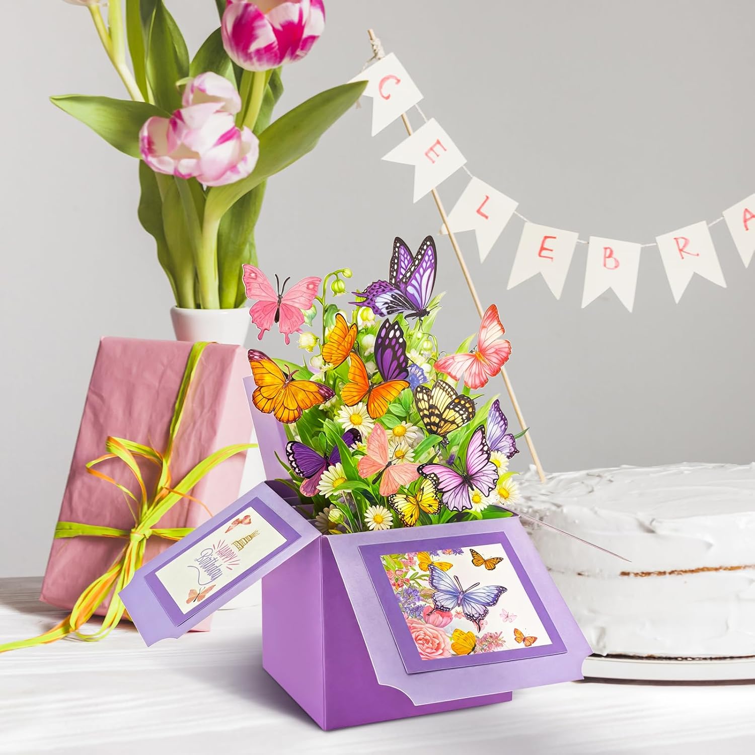 Hierein butterfly pop-up birthday card for women, featuring vibrant butterfly designs and cheerful "Happy Birthday" message inside.