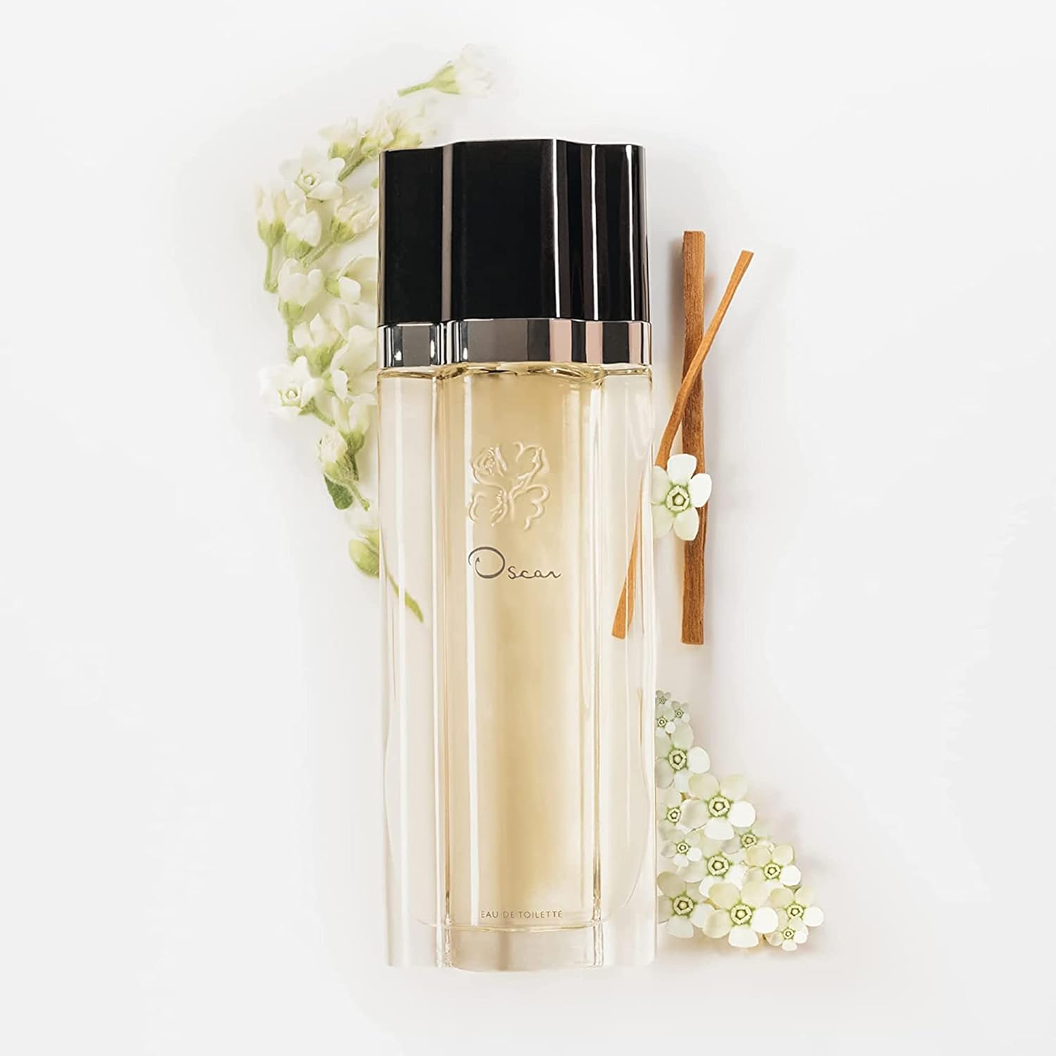 Oscar de la Renta Eau de Toilette Oscar Signature Collection perfume spray for women, elegant bottle and floral design.