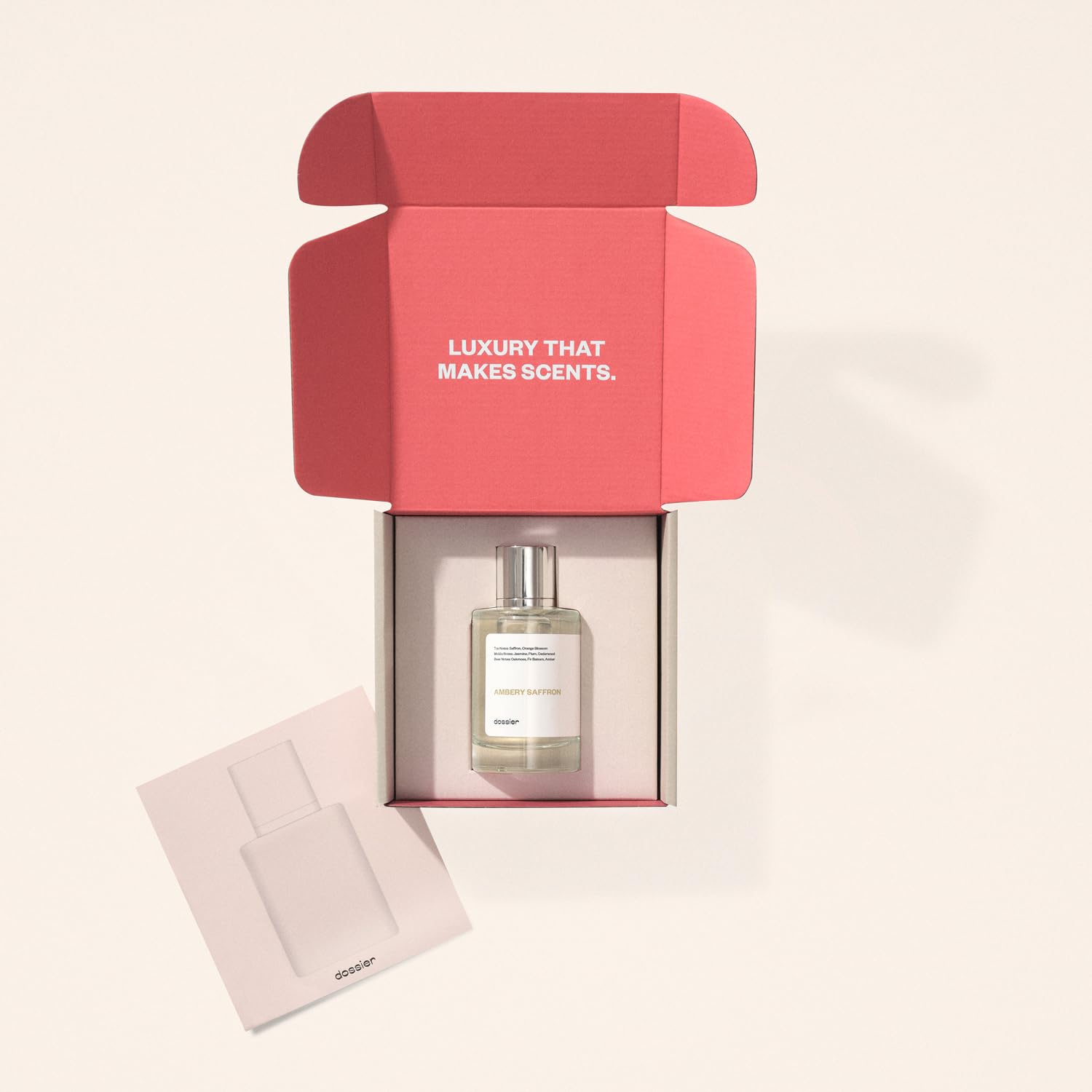 Dossier Ambery Saffron Eau de Parfum bottle with gold accents, featuring a luxurious amber and saffron fragrance appearance.
