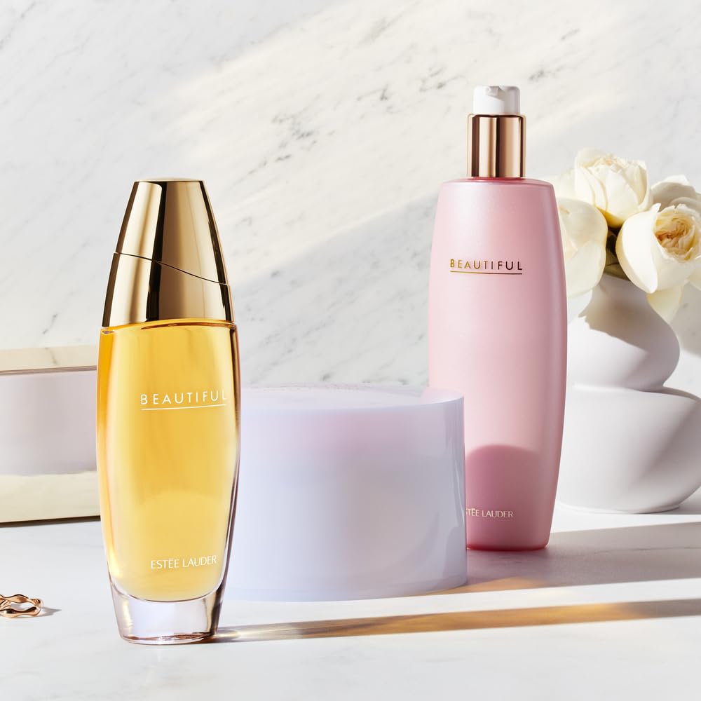 Estée Lauder Beautiful Eau de Parfum spray with rose, lily, tuberose, and orange flower notes, displayed in a sleek perfume bottle.