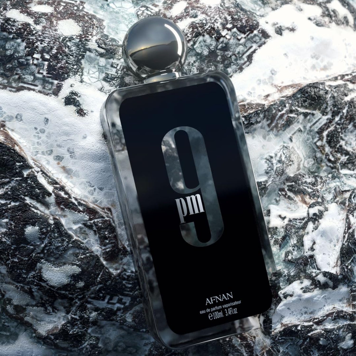 Afnan 9 PM for Men Eau De Parfum bottle with sleek black design, 3.4 fl oz, showcasing the fragrance packaging.