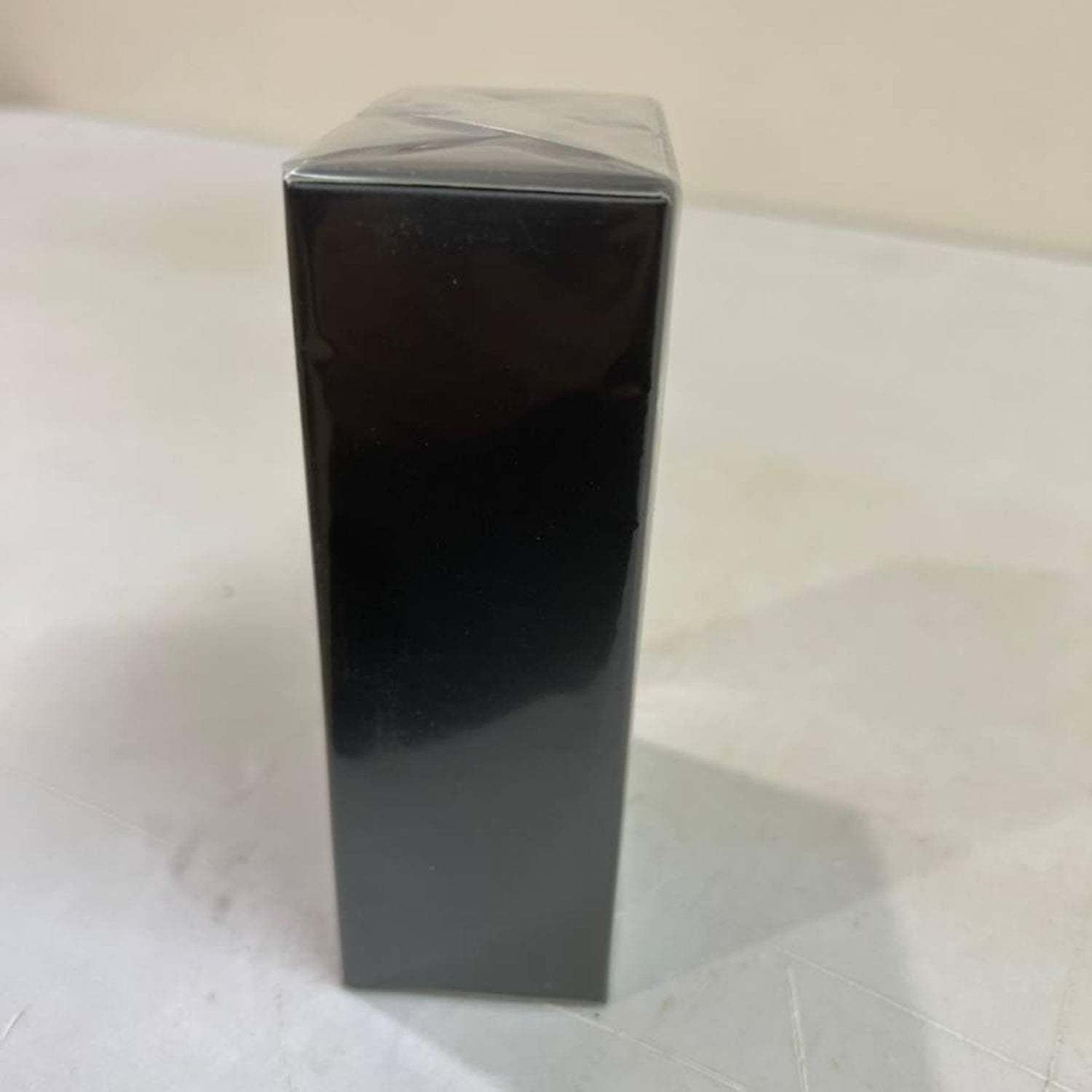 NovoGlow Novo Infinity eau de parfum spray for men in a sleek 3.4 oz bottle, showcasing the elegant fragrance packaging.