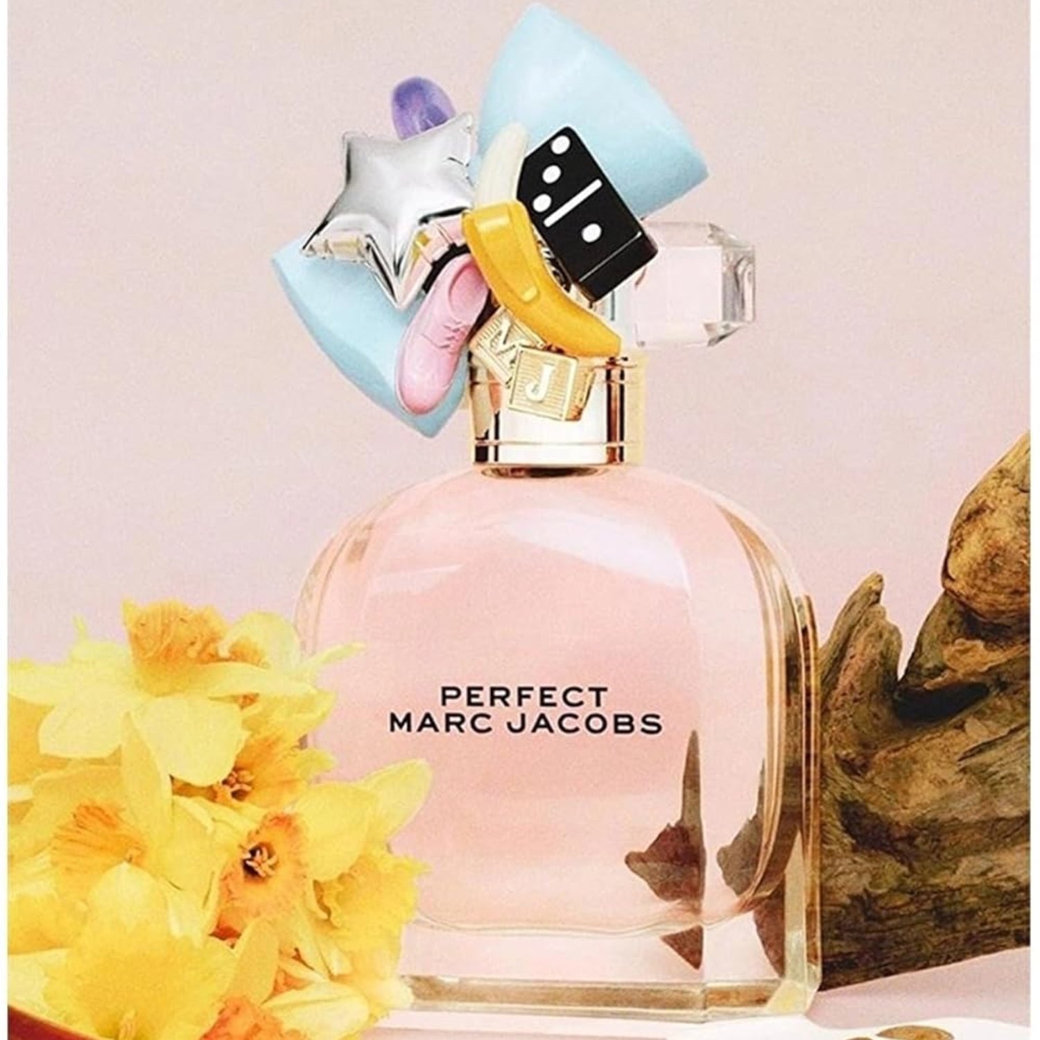 Elefair Marc Jacobs Perfect Eau de Parfum for women featuring floral notes of rhubarb and daffodil in elegant bottle