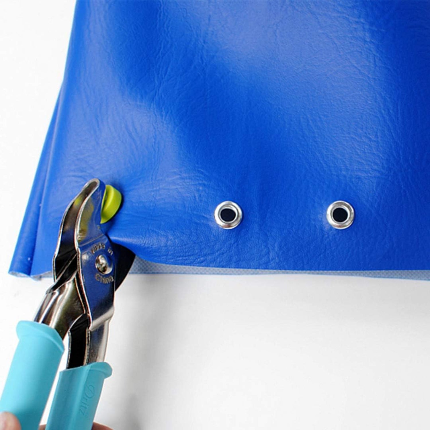 Dritz turquoise eyelet pliers for 5/32" and 1/4" eyelets, hand tool for fabric and craft projects