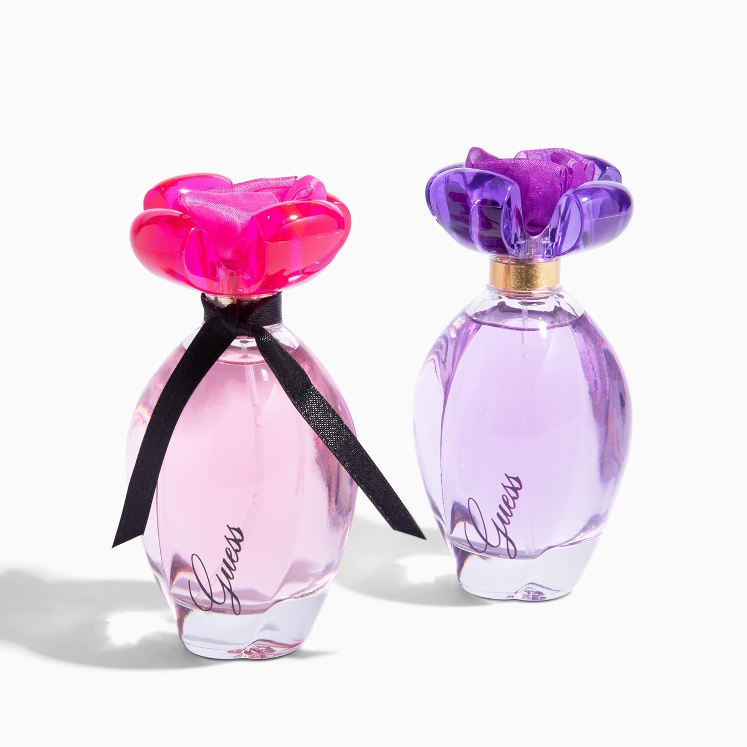 GUESS Girl Eau de Toilette spray for women, 3.4 ounces, featuring a sleek bottle with playful pink accents.