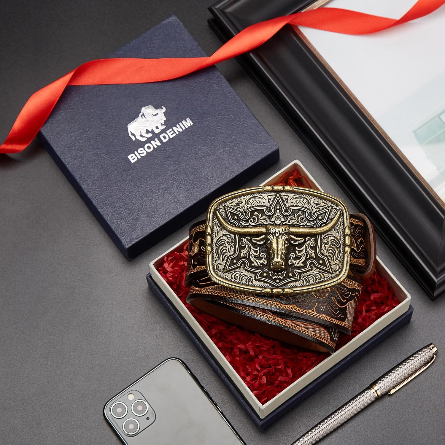 BISON DENIM men's western cowboy belt with printed engraved buckle and leather strap, showcasing rugged denim and detailed buckle design.