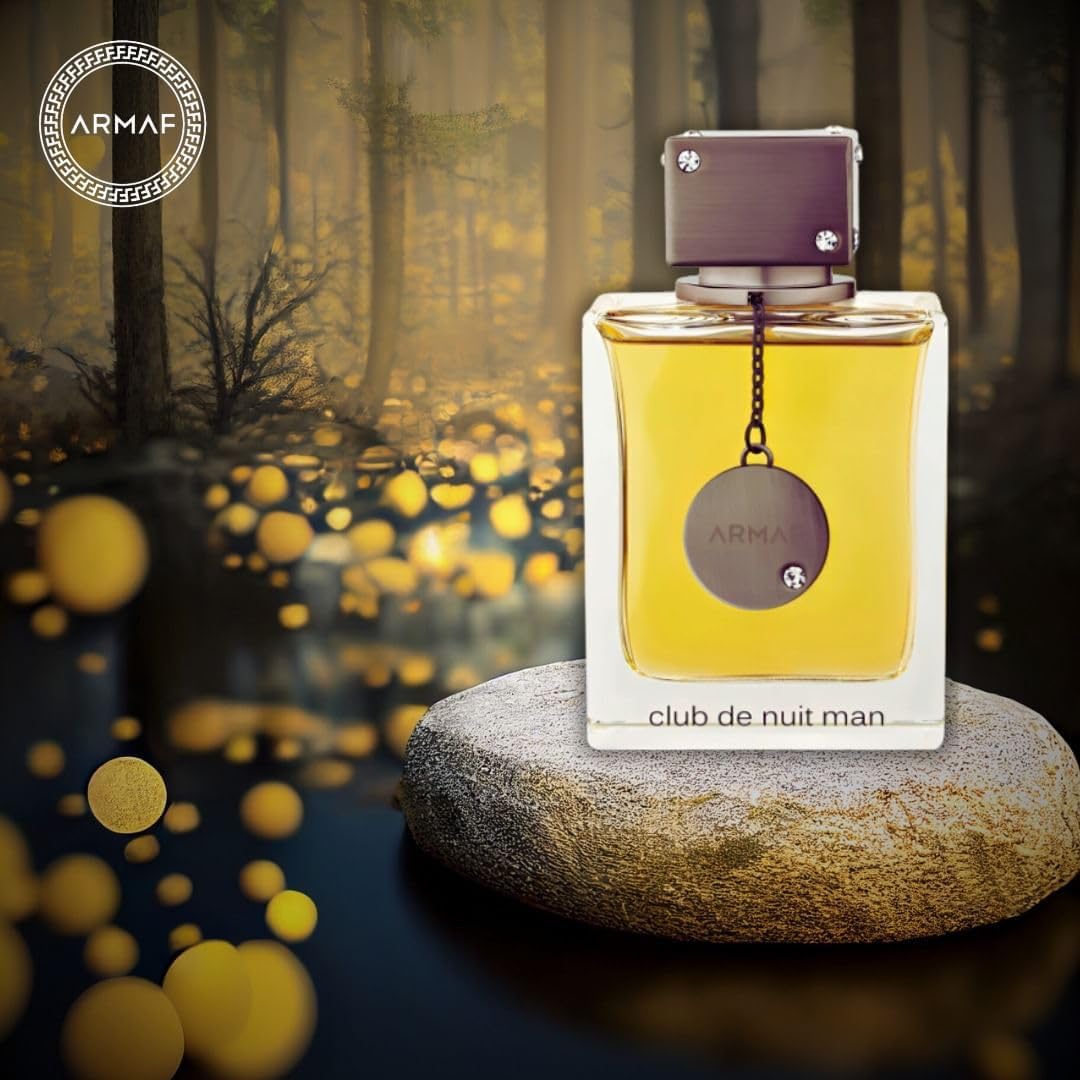 Armaf Club de Nuit Man Eau de Toilette spray bottle with black cap and sleek design, ready for use.