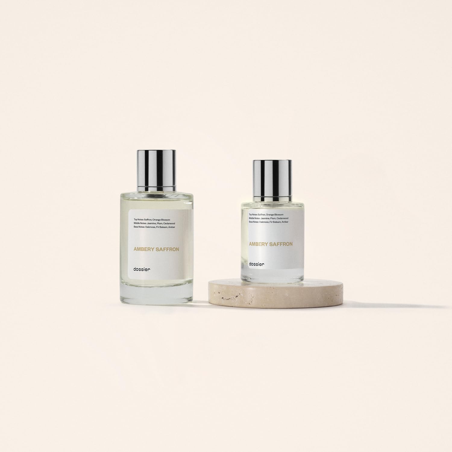 Dossier Ambery Saffron Eau de Parfum bottle with gold accents, showcasing the vegan fragrance inspired by MFK B.accarat R.ouge.