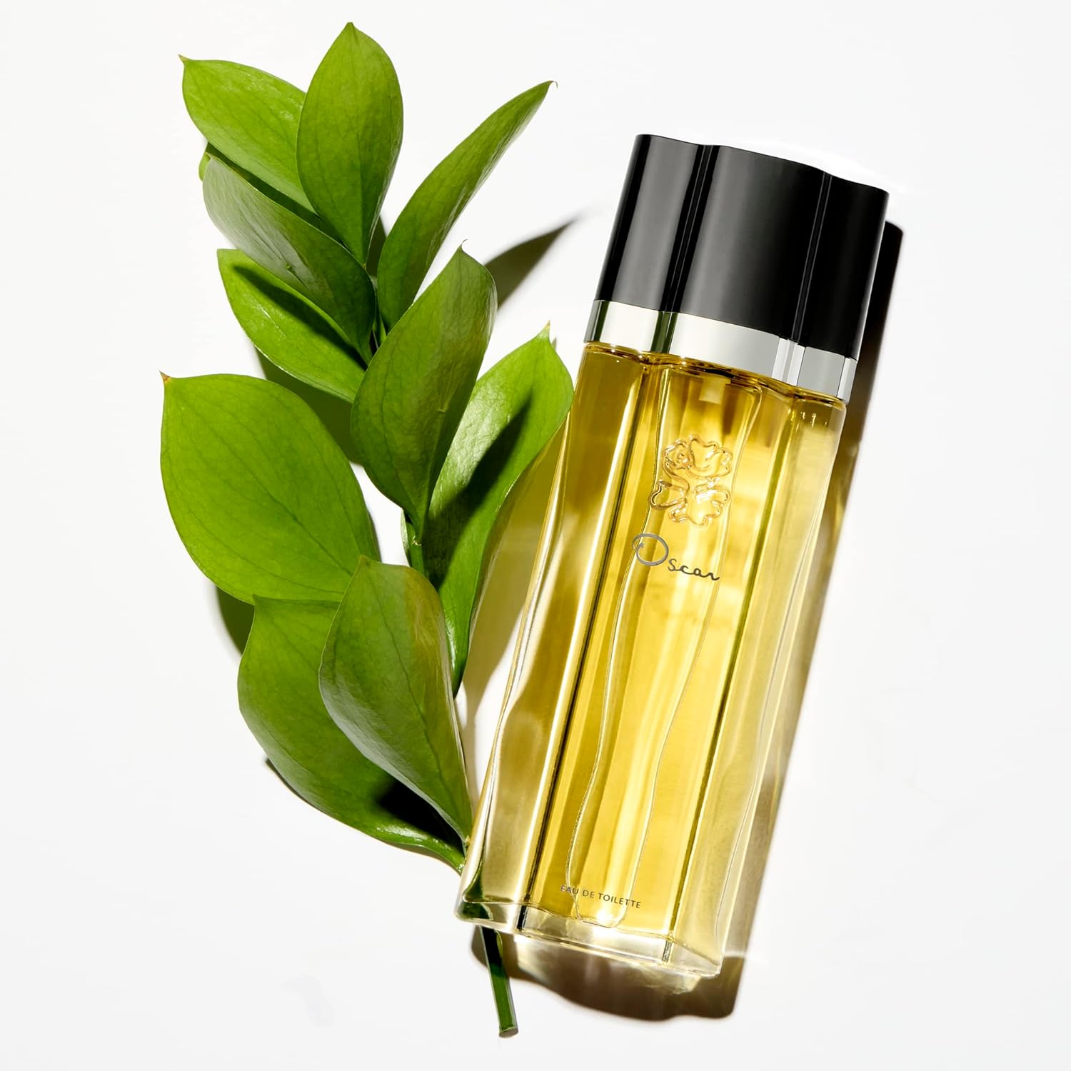 Oscar de la Renta Eau de Toilette perfume spray for women from the Oscar Signature Collection by Elefair, featuring a sleek bottle design.