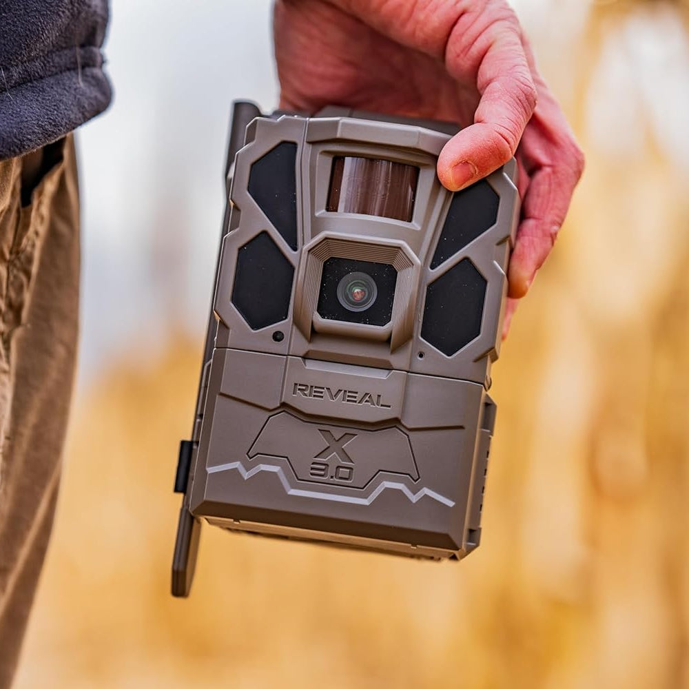 Tactacam REVEAL X Gen 3.0 cellular trail camera showing HD photos and videos, multi-carrier support, outdoor wildlife monitoring.