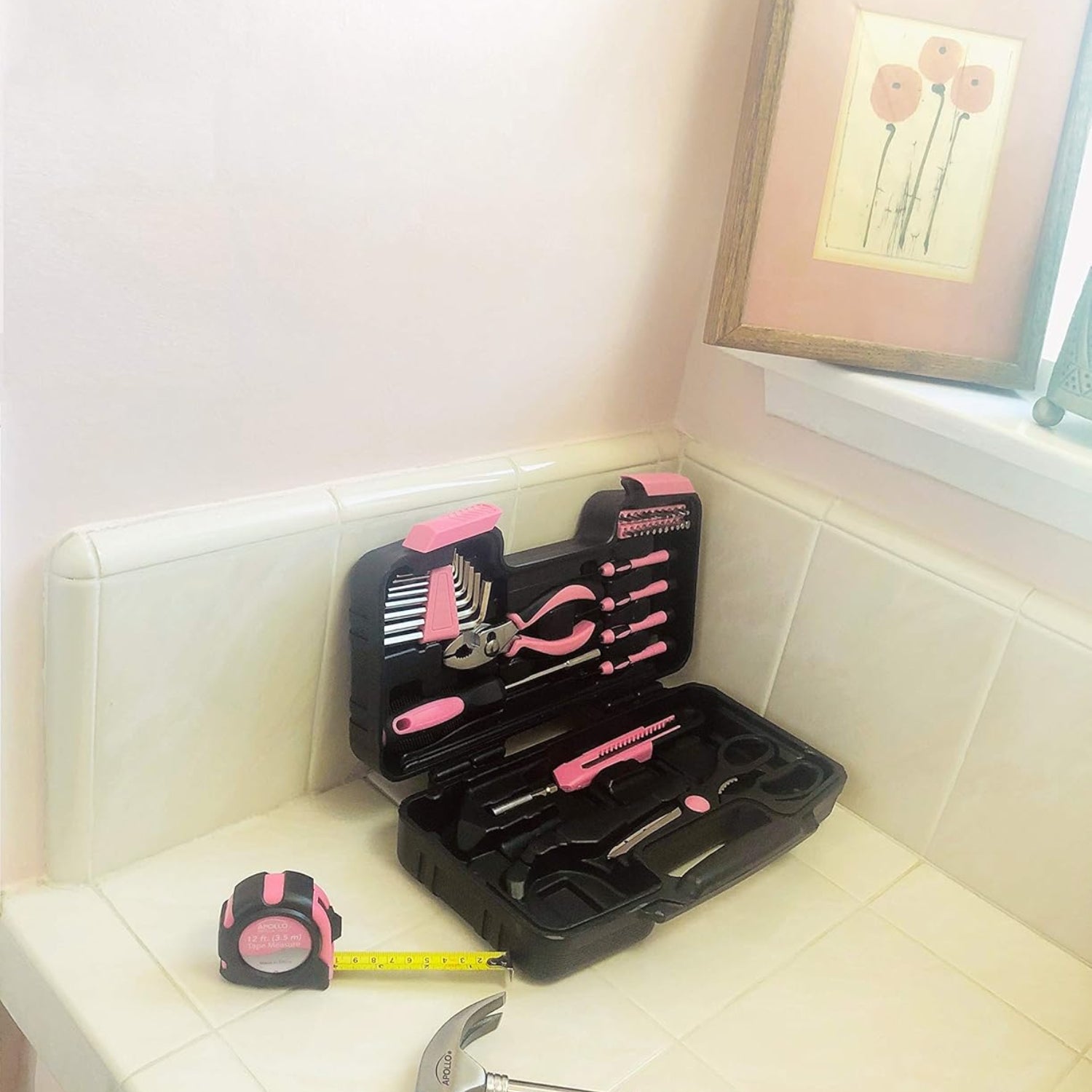 Apollo Tools 39-piece household tool set in a sturdy toolbox, including screwdrivers, pliers, wrenches, and more for home repairs.